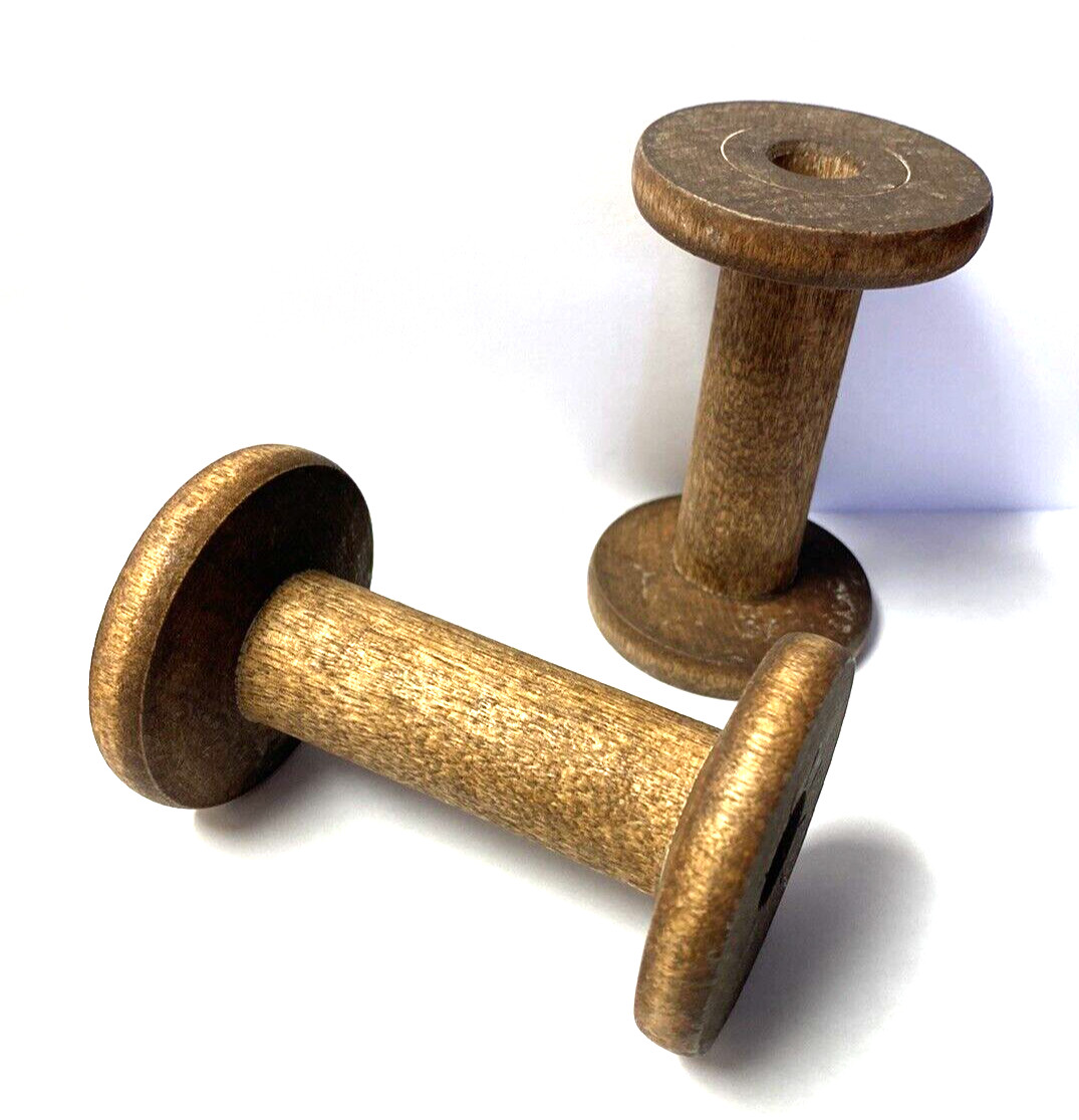 A  Pair of 4 Inch Wooden Silk Spools