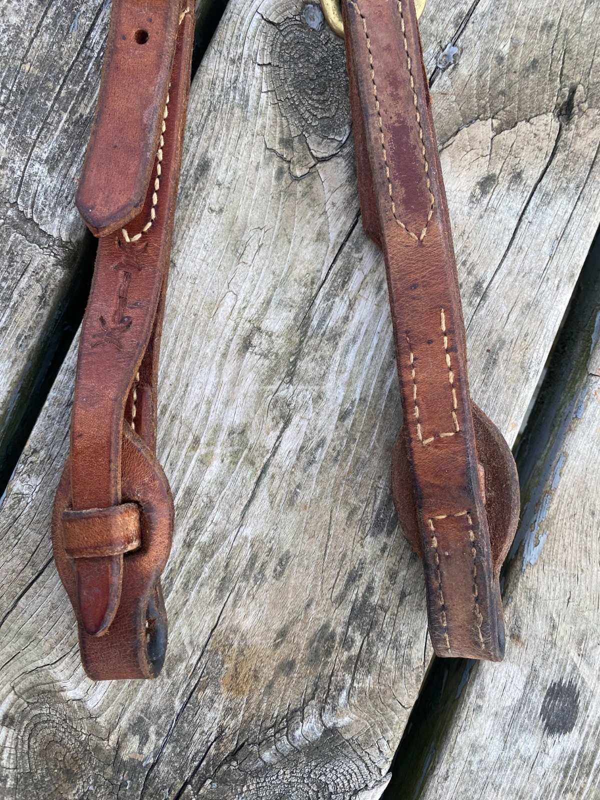 Used Schutz Bros barb wire tooled one ear western headstall w/quick change ends