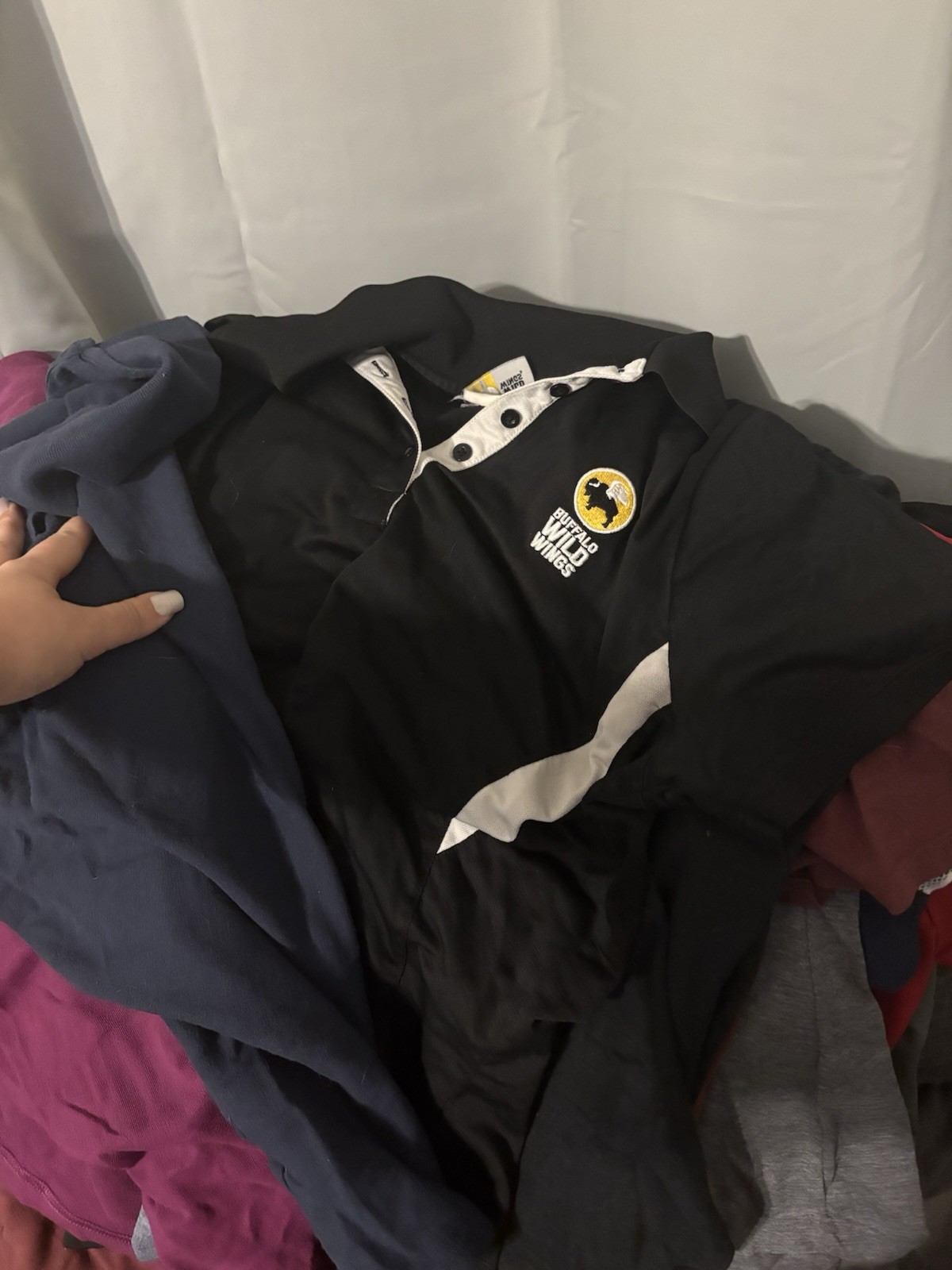 17 shirts!! Women’s Large/XL BWW Manager Polos Buffalo Wild Wings. Added vest