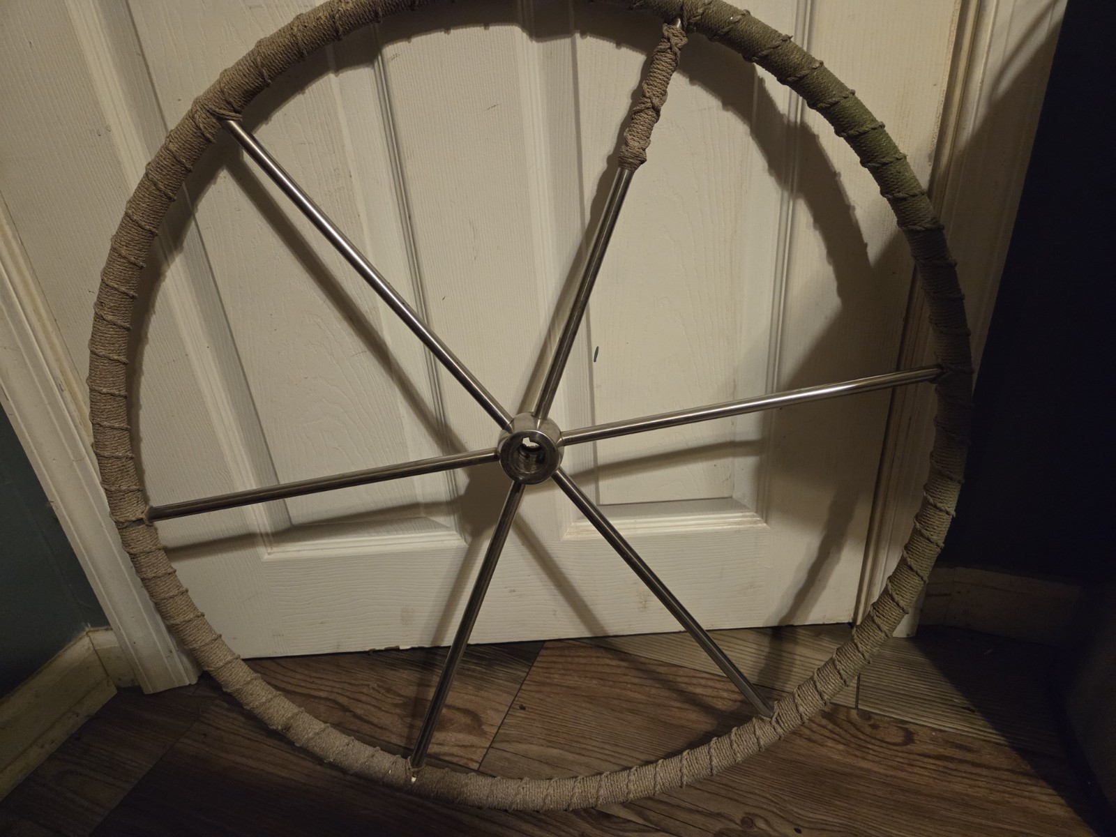 stainless steel sailboat steering wheel, sometimes called a destroyer wheel