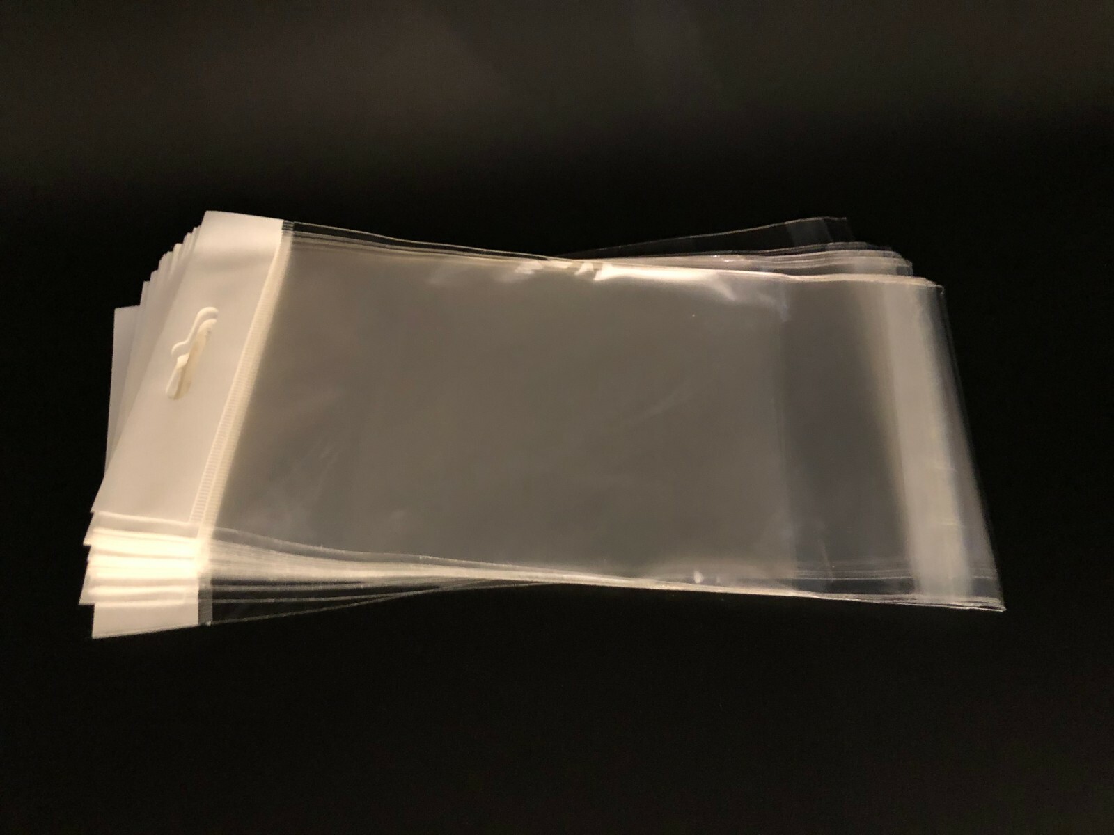 100 Clear Cello Bags HANG TOP, Resealable Self Adhesive OPP Poly Hang Hole bag