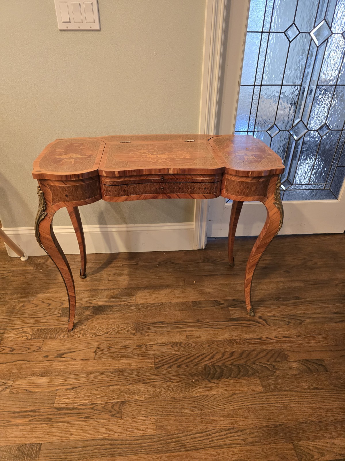 "Antique vanity table from the late 1800s with intricate inlay & a hidden mirror
