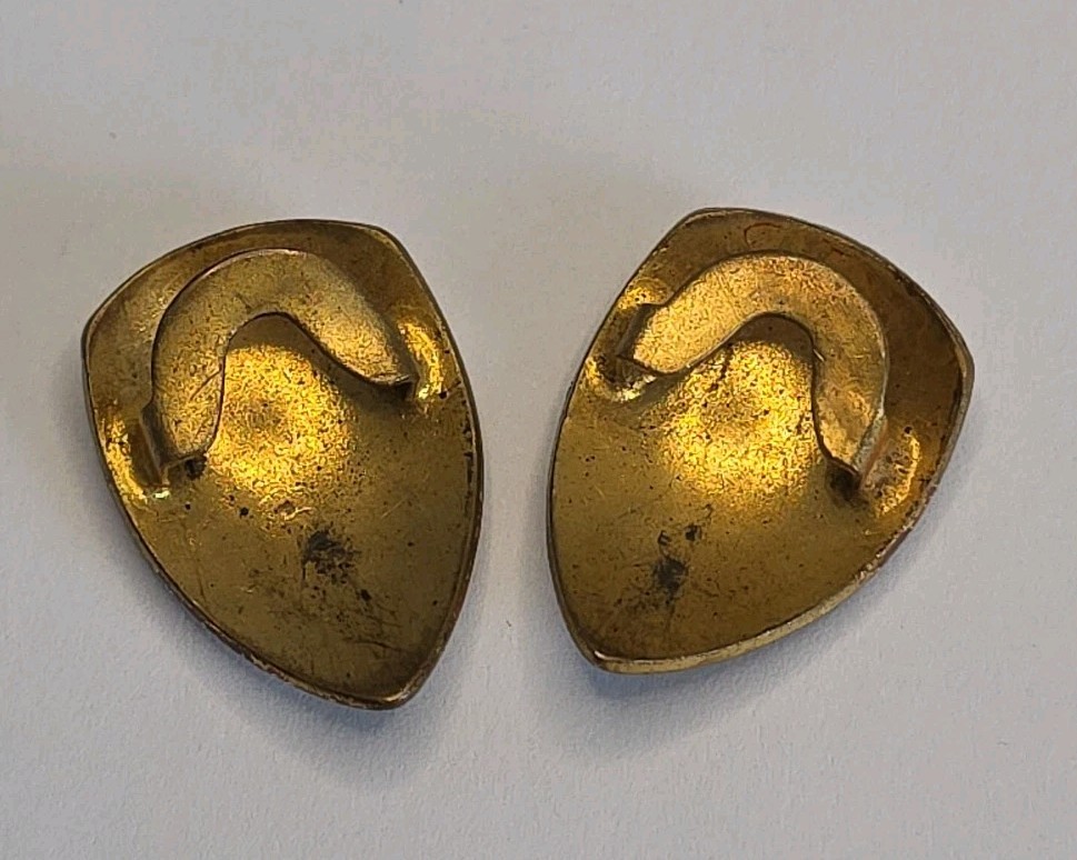 PAIR OF ANTIQUE ART NOVEAU BRASS FLEUR DE LIS SHIELD BUTTON COVERS