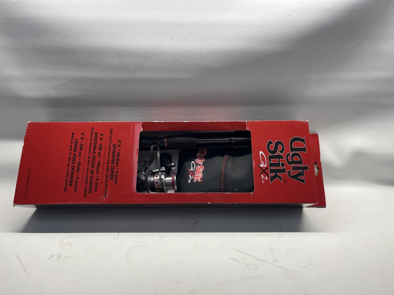 UGLY STIK GX2 FISHING POLE AND REEL