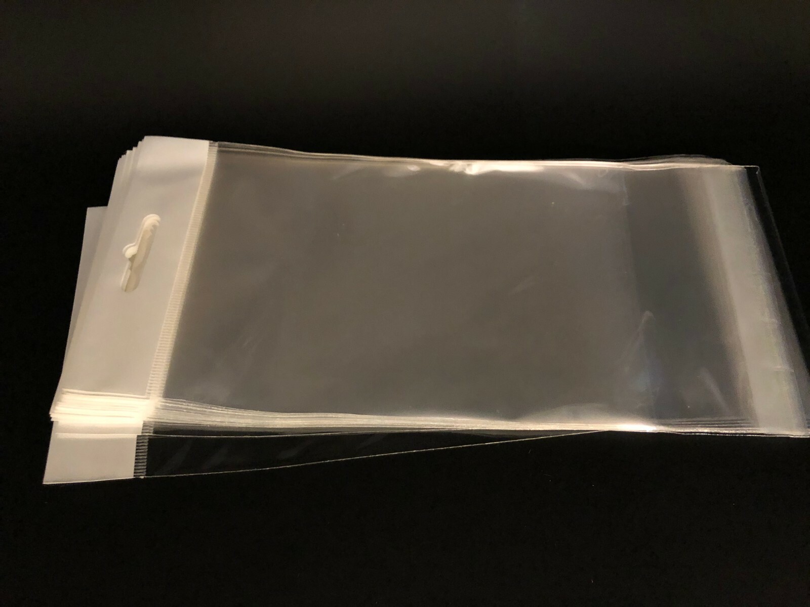 100 Clear Cello Bags HANG TOP, Resealable Self Adhesive OPP Poly Hang Hole bag