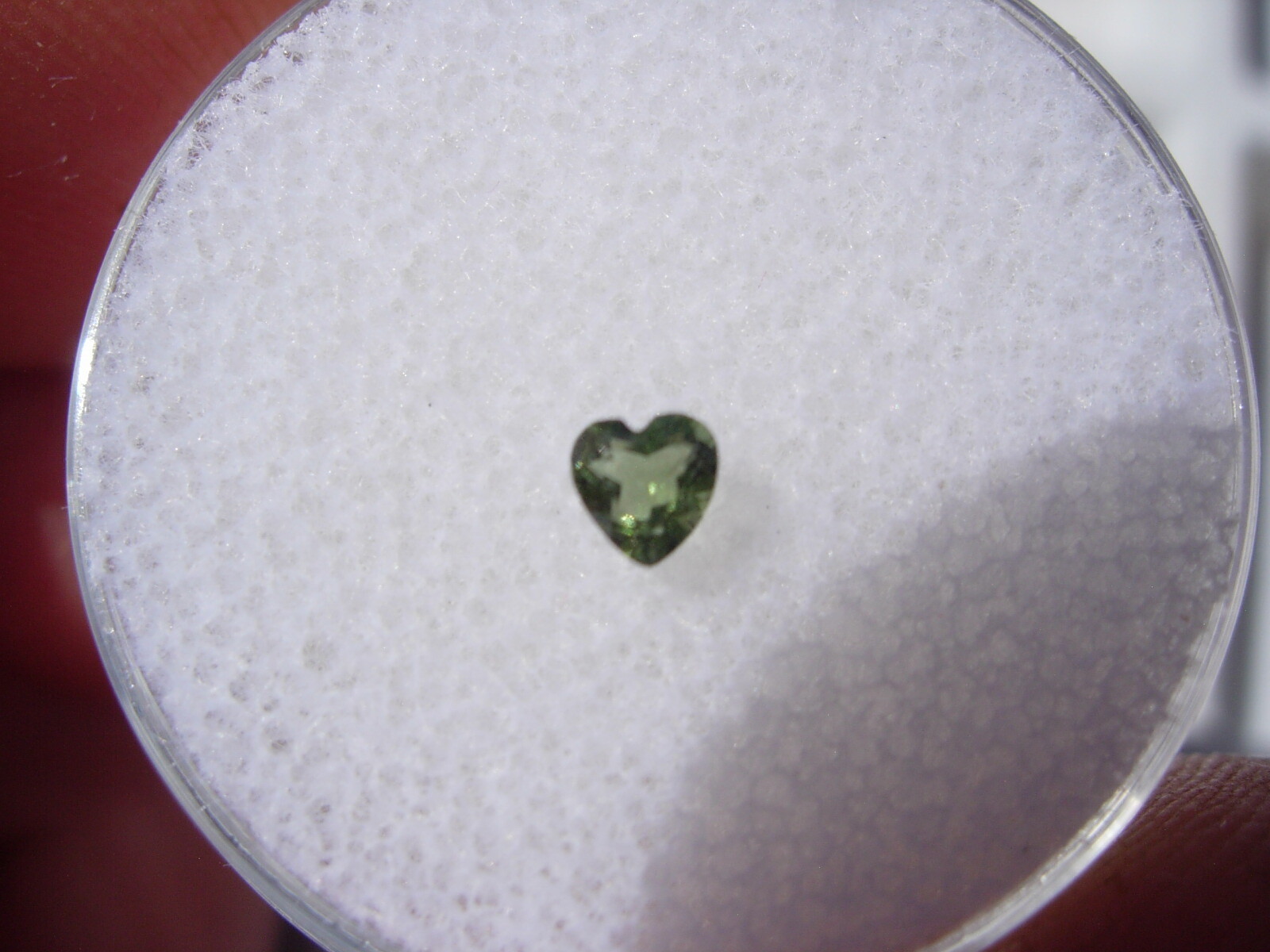 .116 carat Moldavite Faceted Heart Czech Republic Meteorite impact about 3x3x2mm