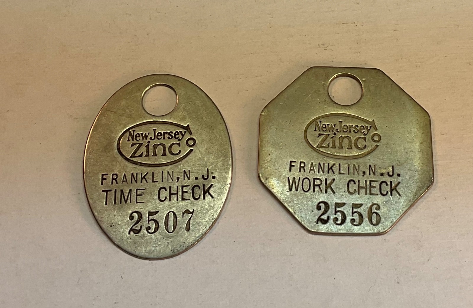 (2) NJZCO MINERS TAGS FRANKLIN NJ NJZCO ZINC FLUORESCENT MINERALS #2507/2556