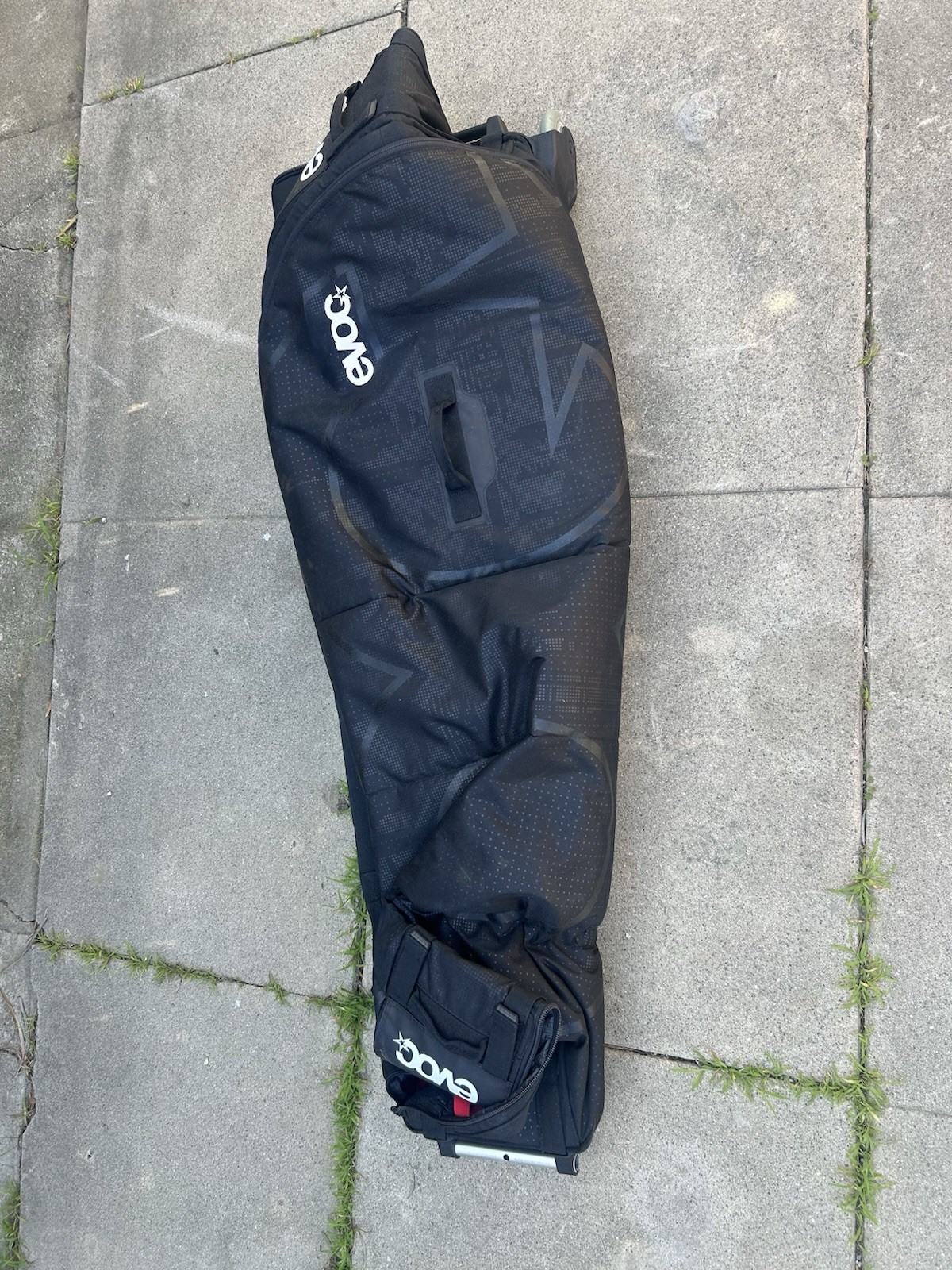 EVOC Bike Transport Bag Black Nylon with Wheels, Carry Handle, Zip Closure