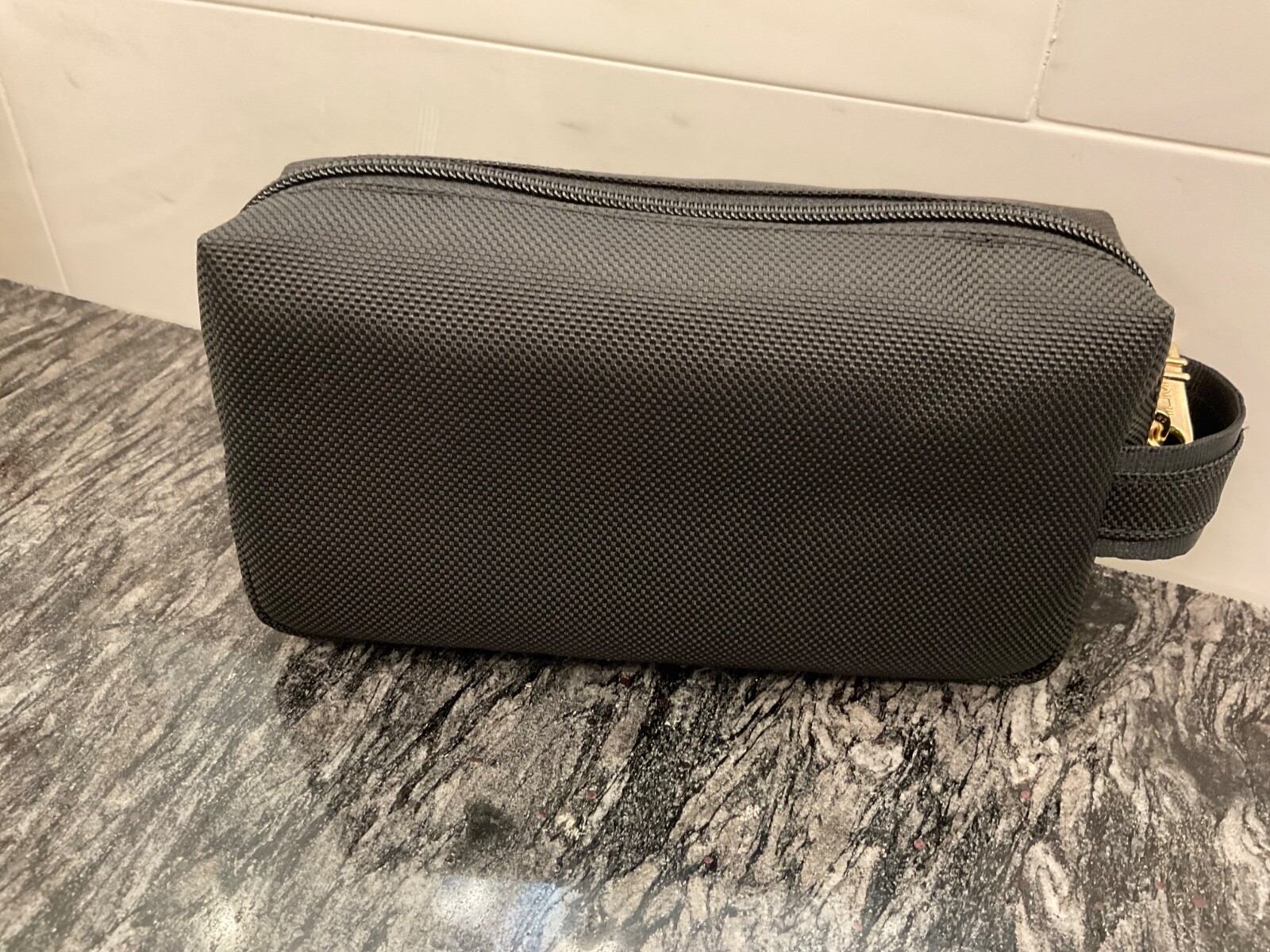 NEW - TUMI Zippered Small Kit - 4”x7” Pouch - Cosmetic Bag - BLACK with GOLD