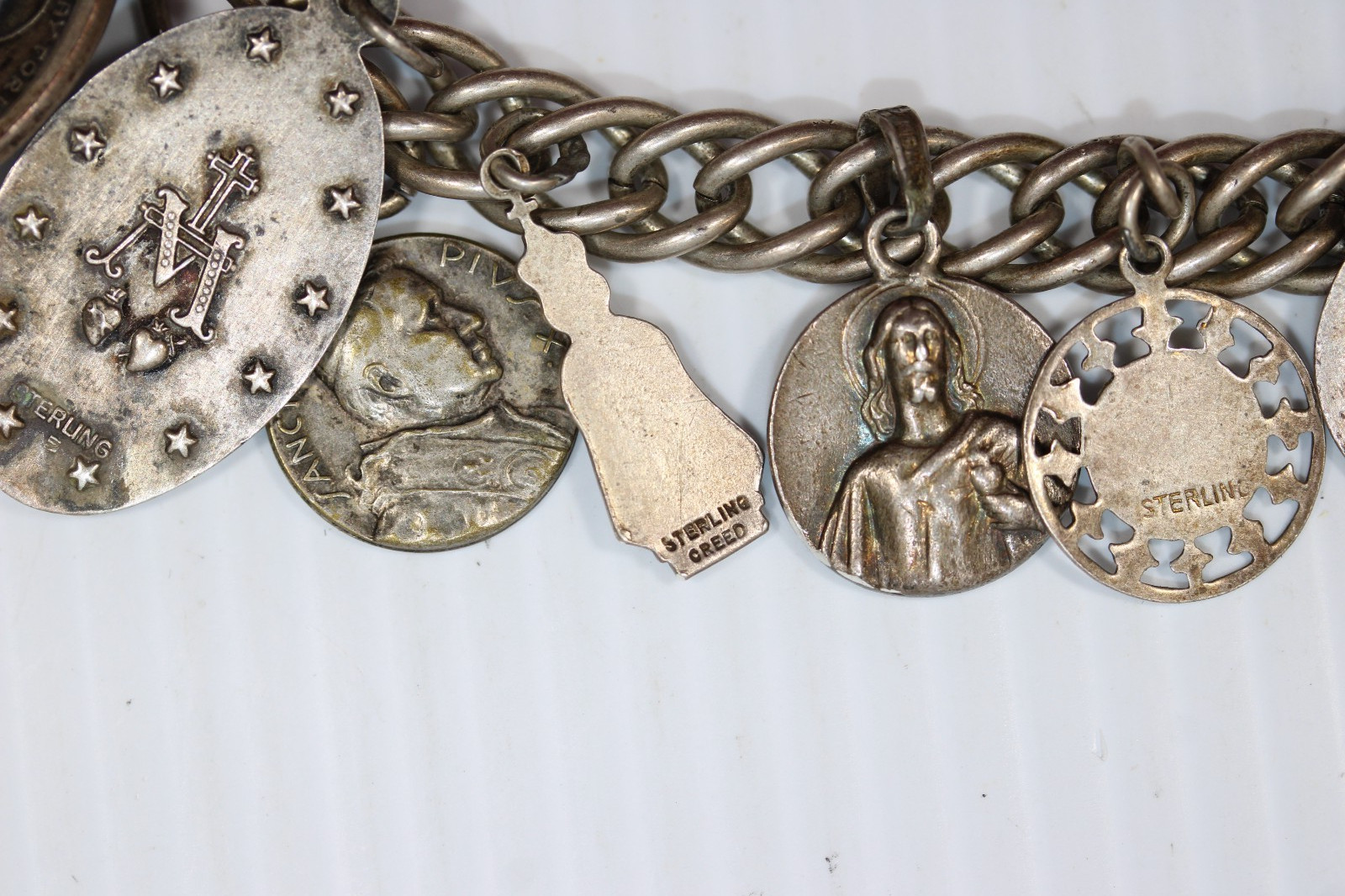 Vintage Sterling Silver Saint Charm Bracelet featuring 13 Medals 60g #450