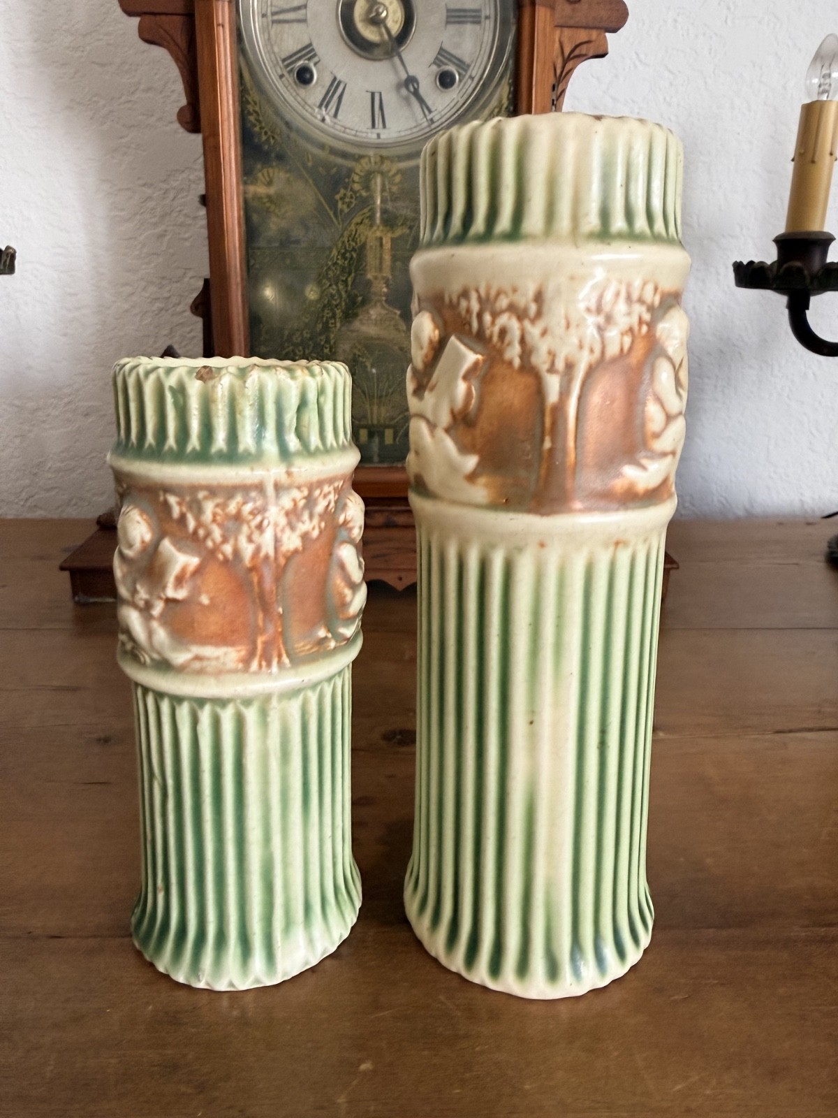 Pair Antique Roseville Donatello Cherub Bud Vases Green Art Pottery 1916