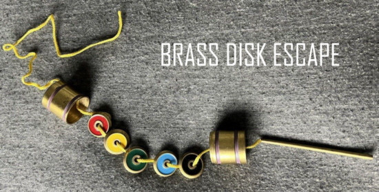 BRASS DISK ESCAPE - CONTAINERS, COLORED DISKS, NEEDLE, STRING & INSTRUCTIONS