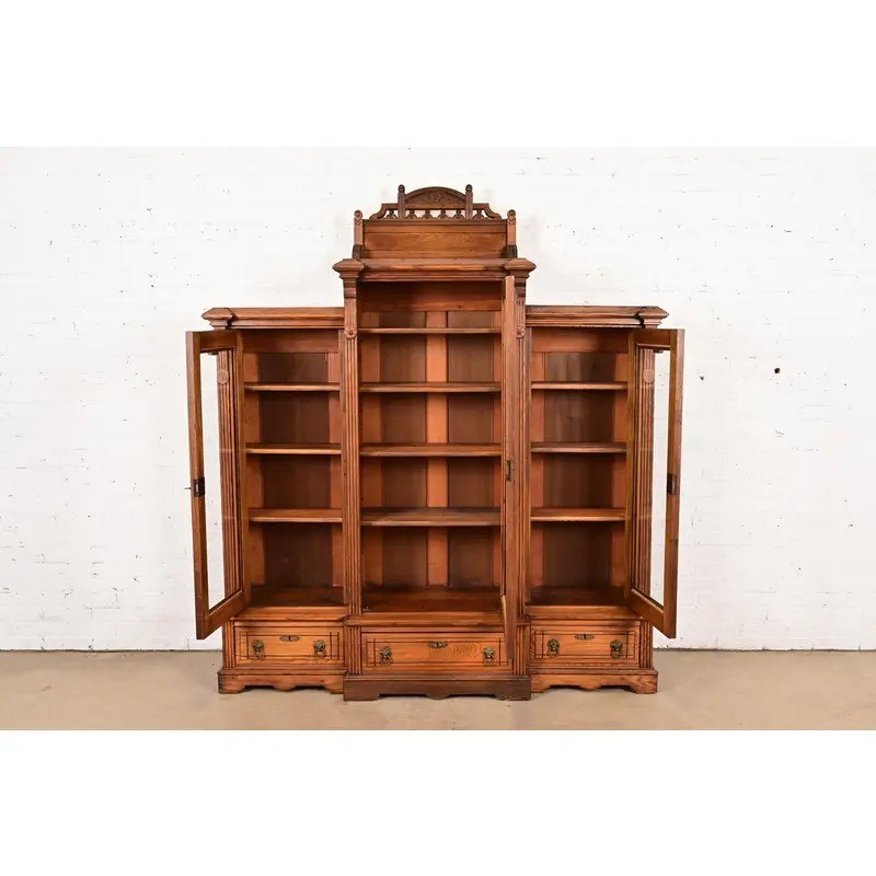 Herter Brothers Style Antique Victorian Carved Oak Bookcase Cabinet, Circa 1880s