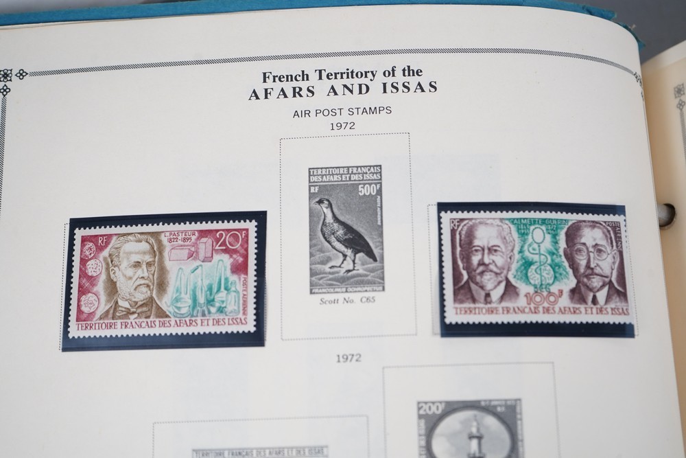 WORLDWIDE A-L 1970s COLLECTION OF 875+ STAMPS MINT & USED STORED IN SCOTT ALBUM