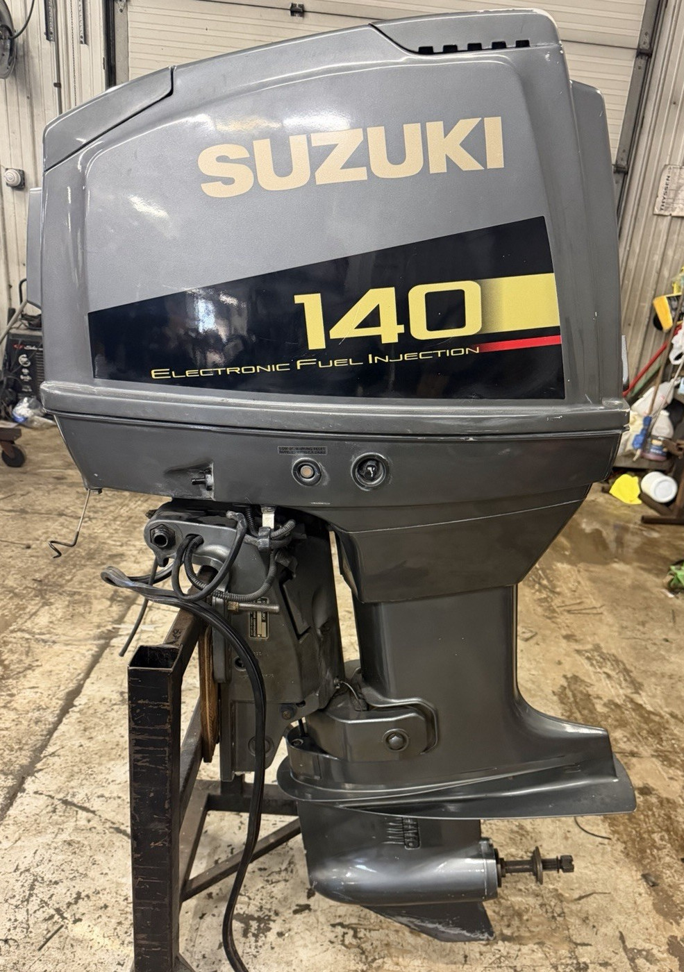 1999 Suzuki DT 140 EFI two stroke oil injected 20" long shaft remote freshwater