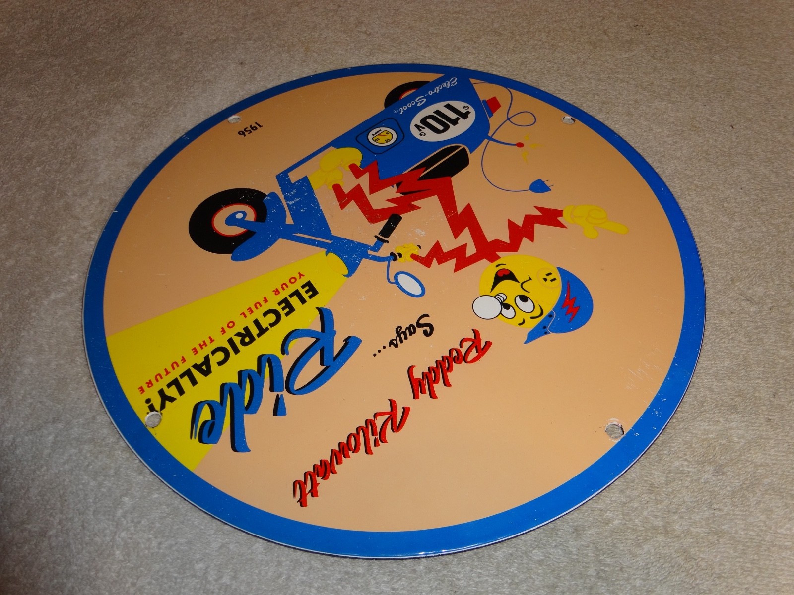 VINTAGE 56 REDDY KILOWATT ELECTRIC SCOOTER 11 3/4" PORCELAIN METAL GASOLINE SIGN