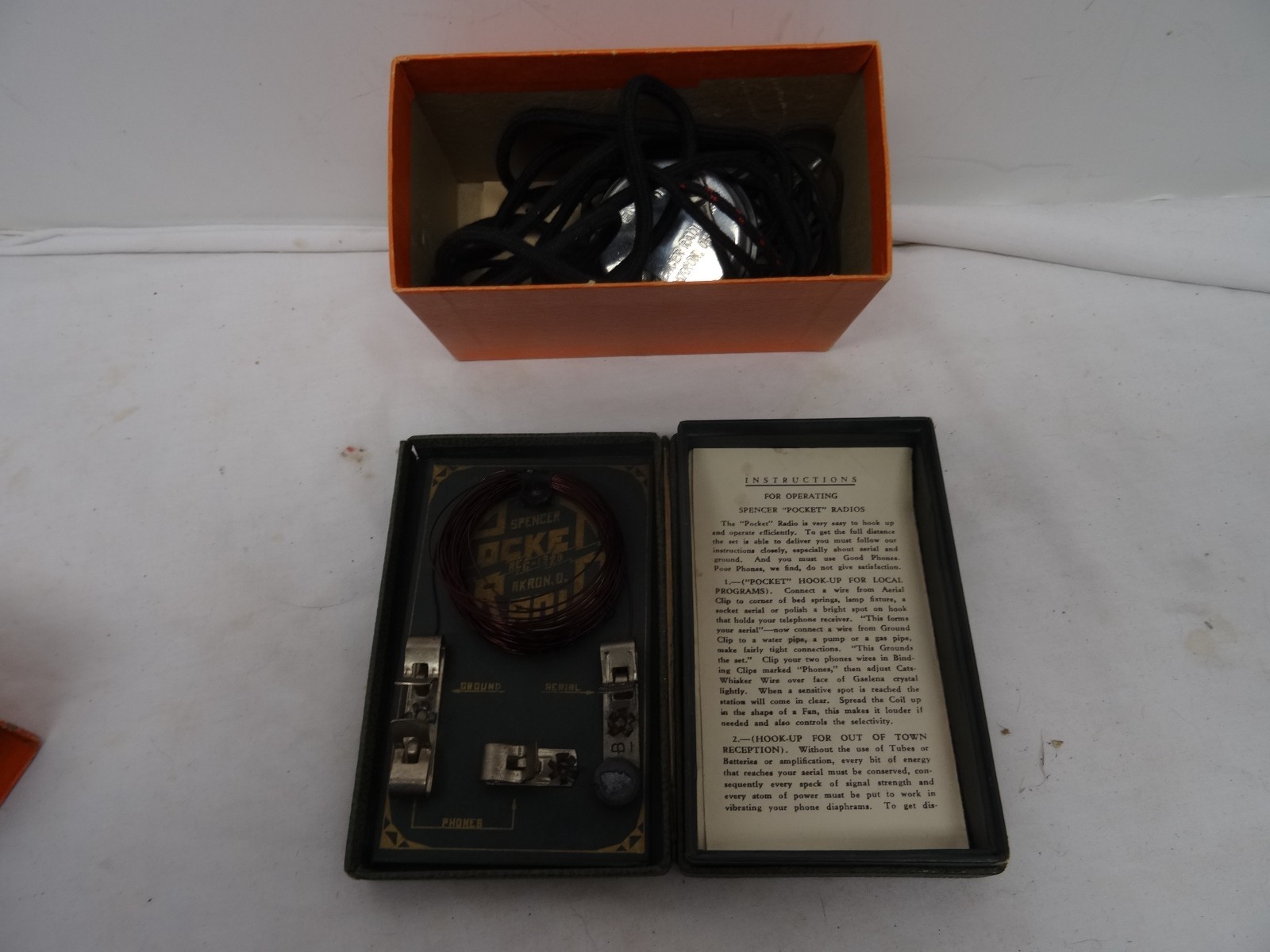 Spencer Pocket Crystal Radio with box and Spencer headphone and cables.