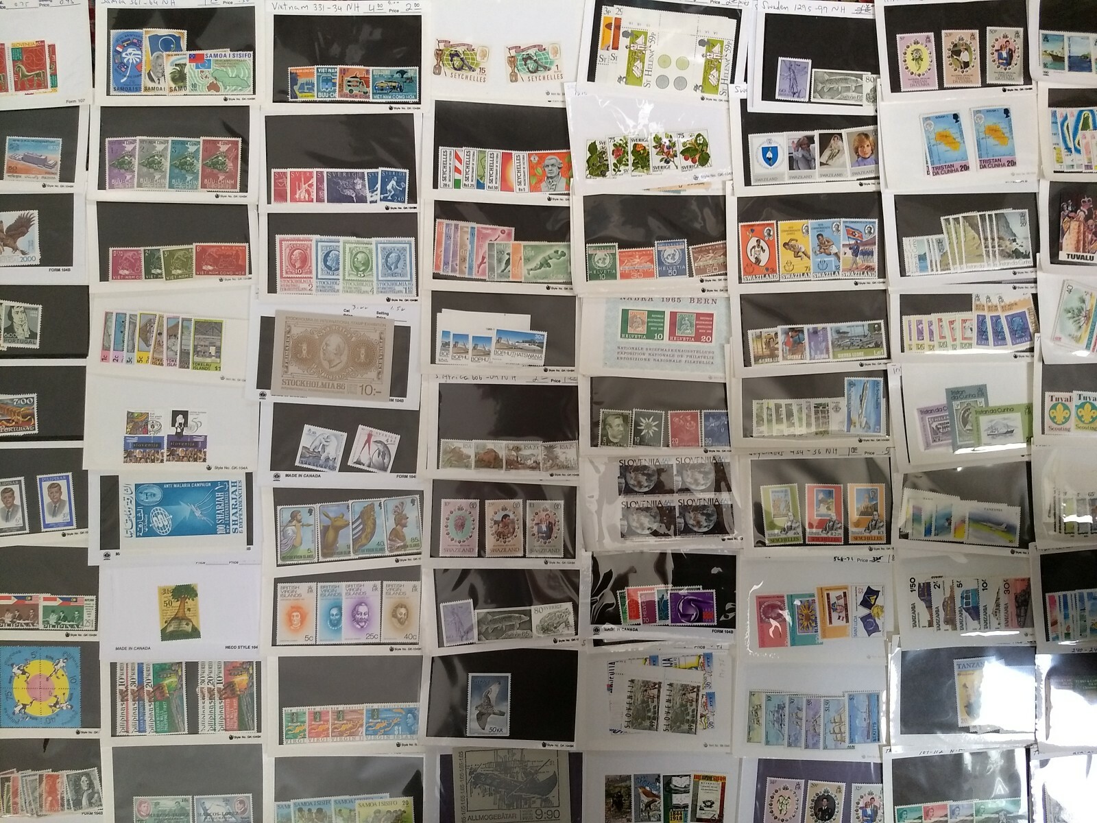 Worldwide Stamp Assortment Mint 100 Different Stamps from 20 Countries Full Sets