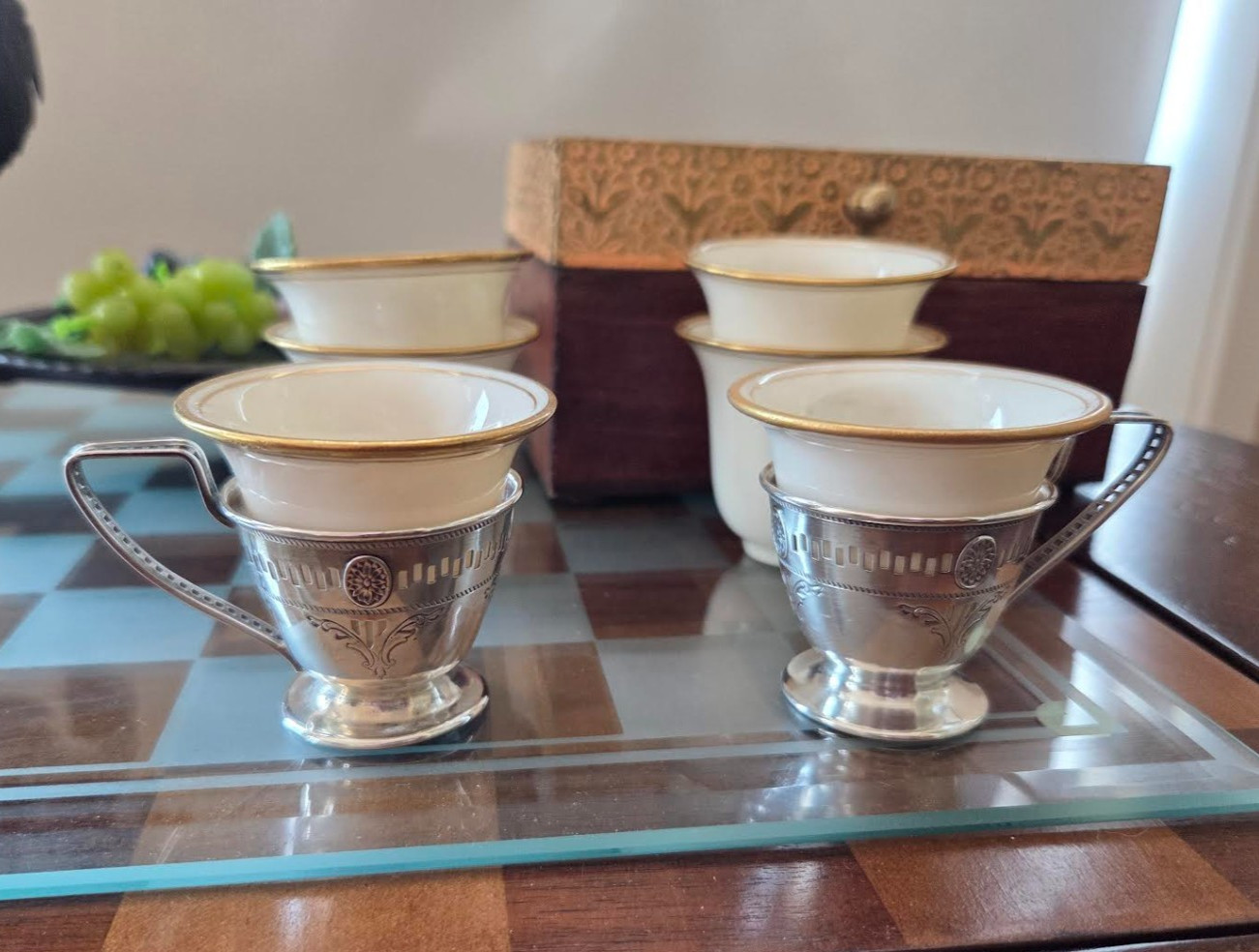 A Pair of Sterling Silver Teacups with 6 Porcelain Inserts