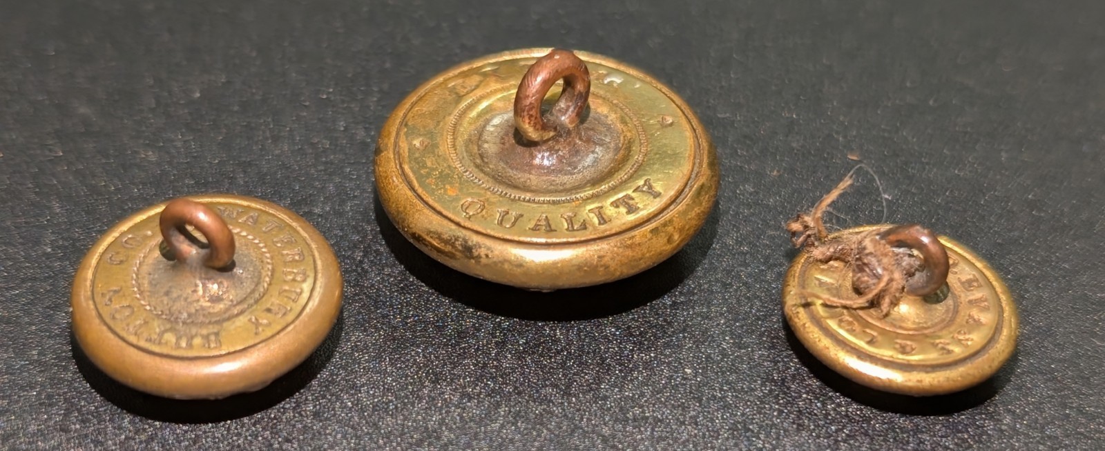 Three Federal Eagle A Artillery Officer's Buttons