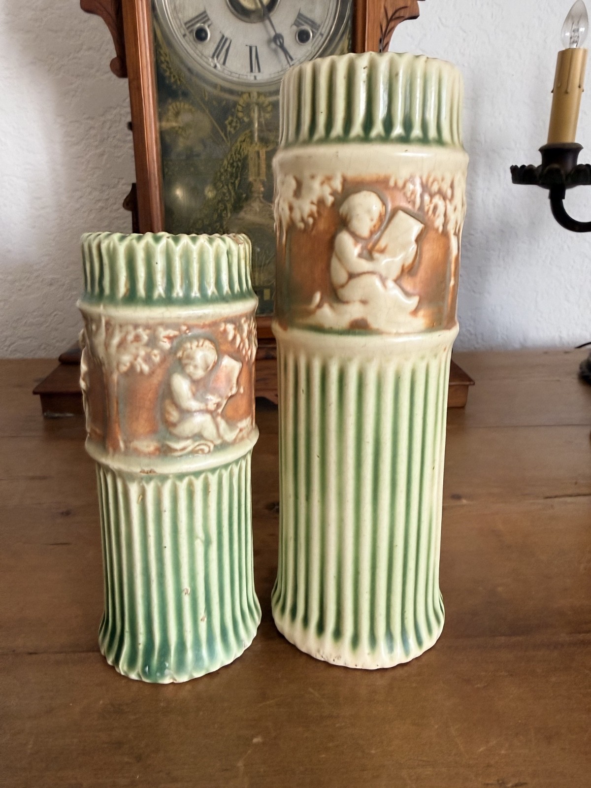 Pair Antique Roseville Donatello Cherub Bud Vases Green Art Pottery 1916