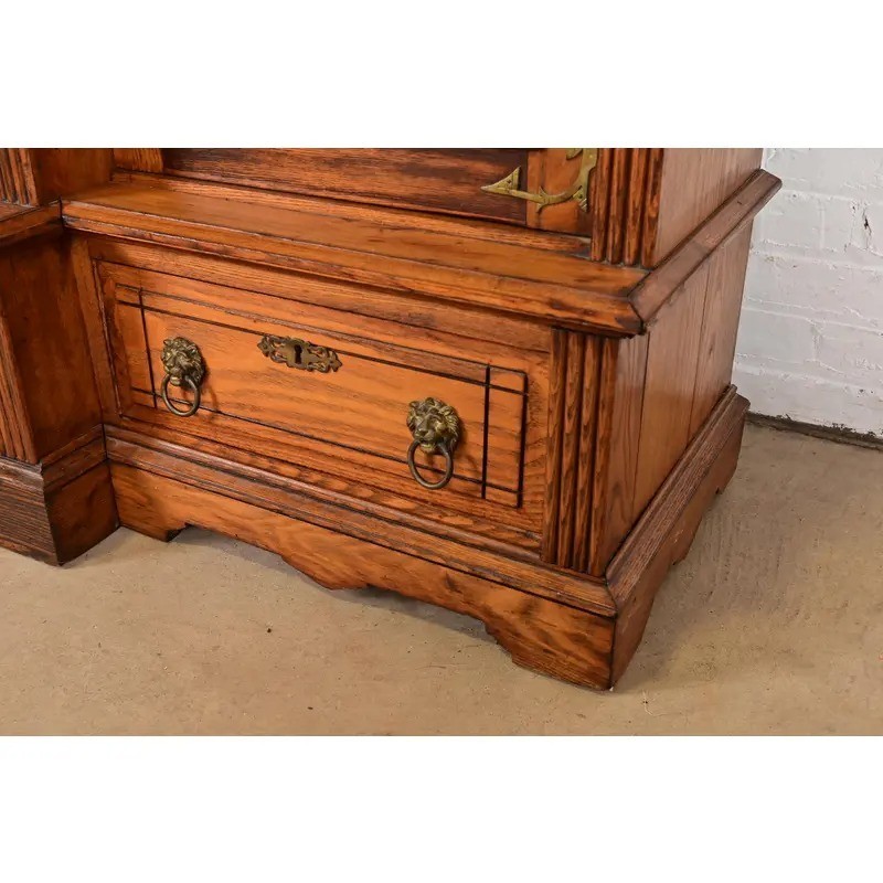 Herter Brothers Style Antique Victorian Carved Oak Bookcase Cabinet, Circa 1880s