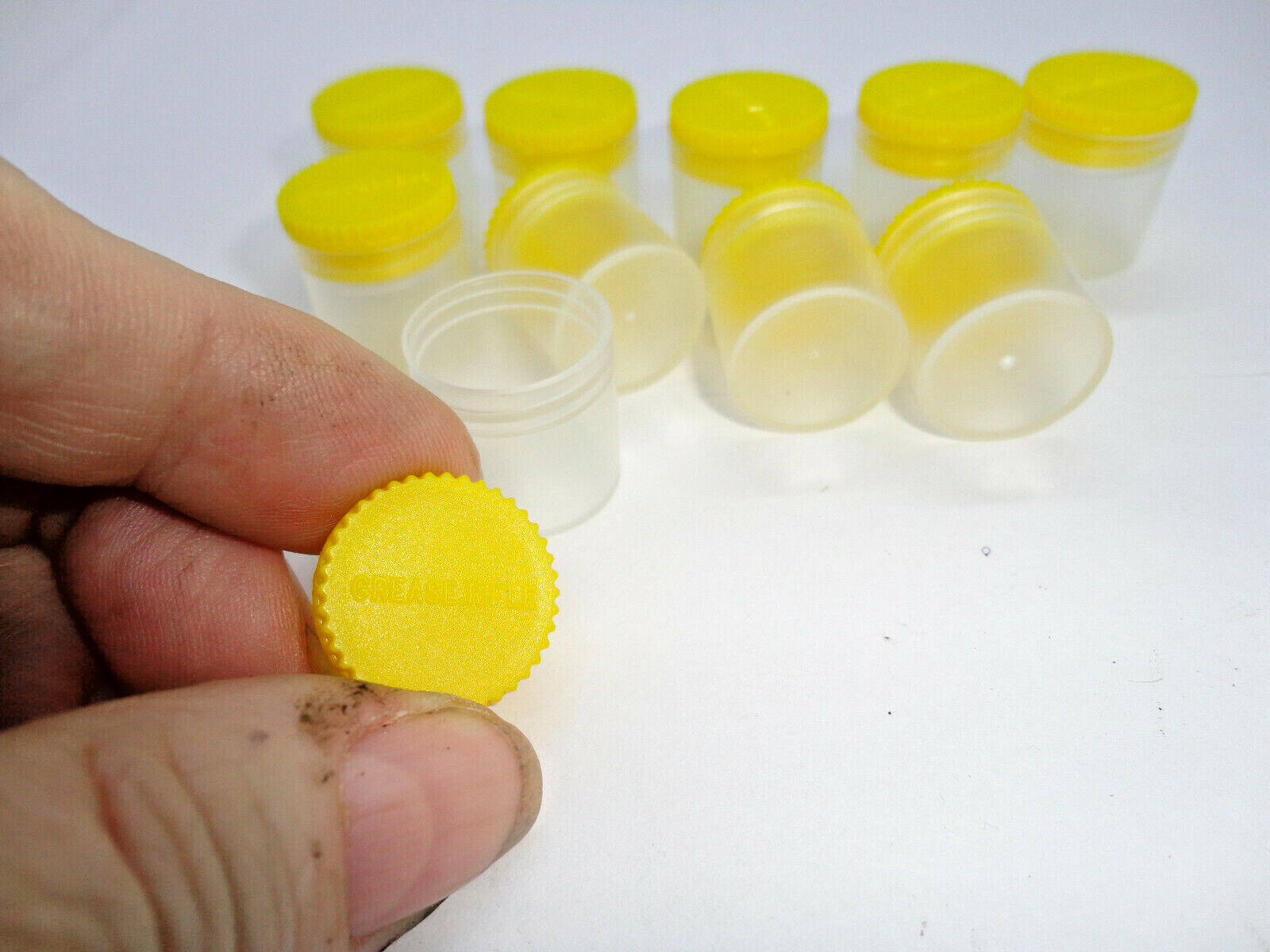 Grease, Rifle empty pots, new, marked ten (10), yellow top