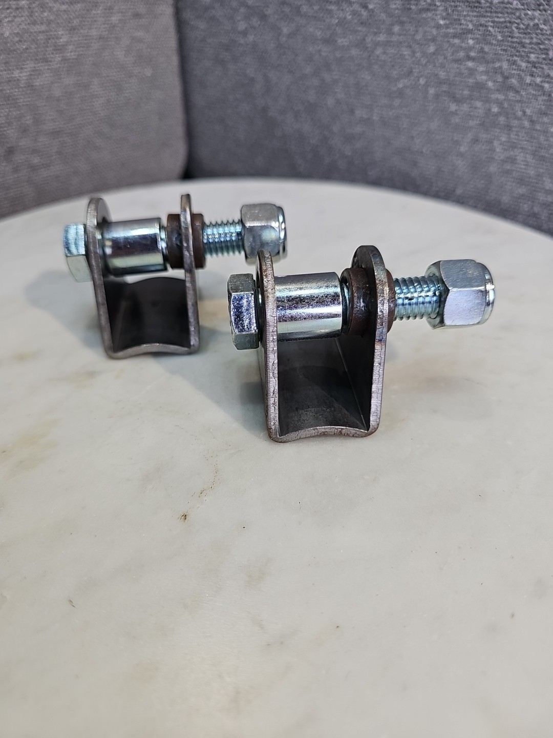 SHOCK COIL OVER BRACKET FLAT MOUNT LOWER NARROW STEEL 1-1/4" WIDE W/BOLT WELD-ON