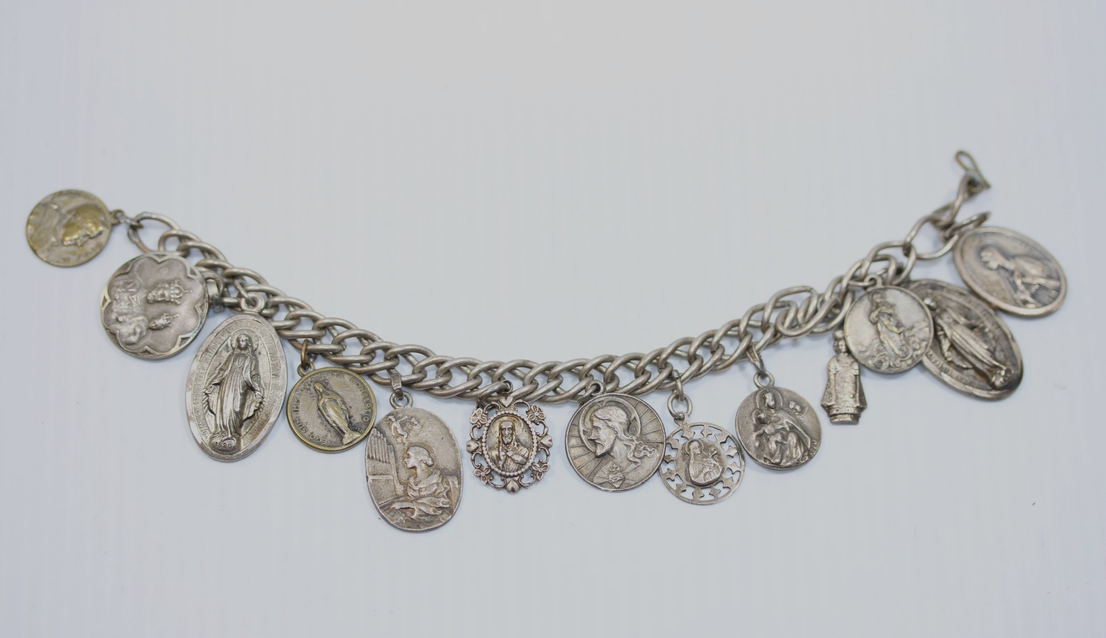 Vintage Sterling Silver Saint Charm Bracelet featuring 13 Medals 60g #450