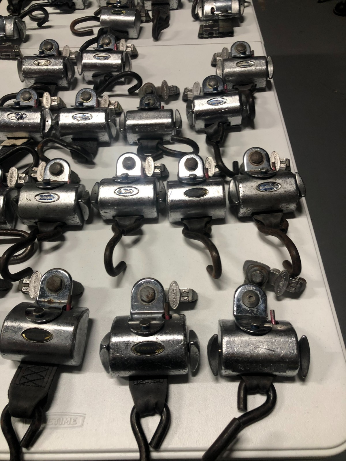 Q'Straint Wheelchair Securement tie Down Retractors.