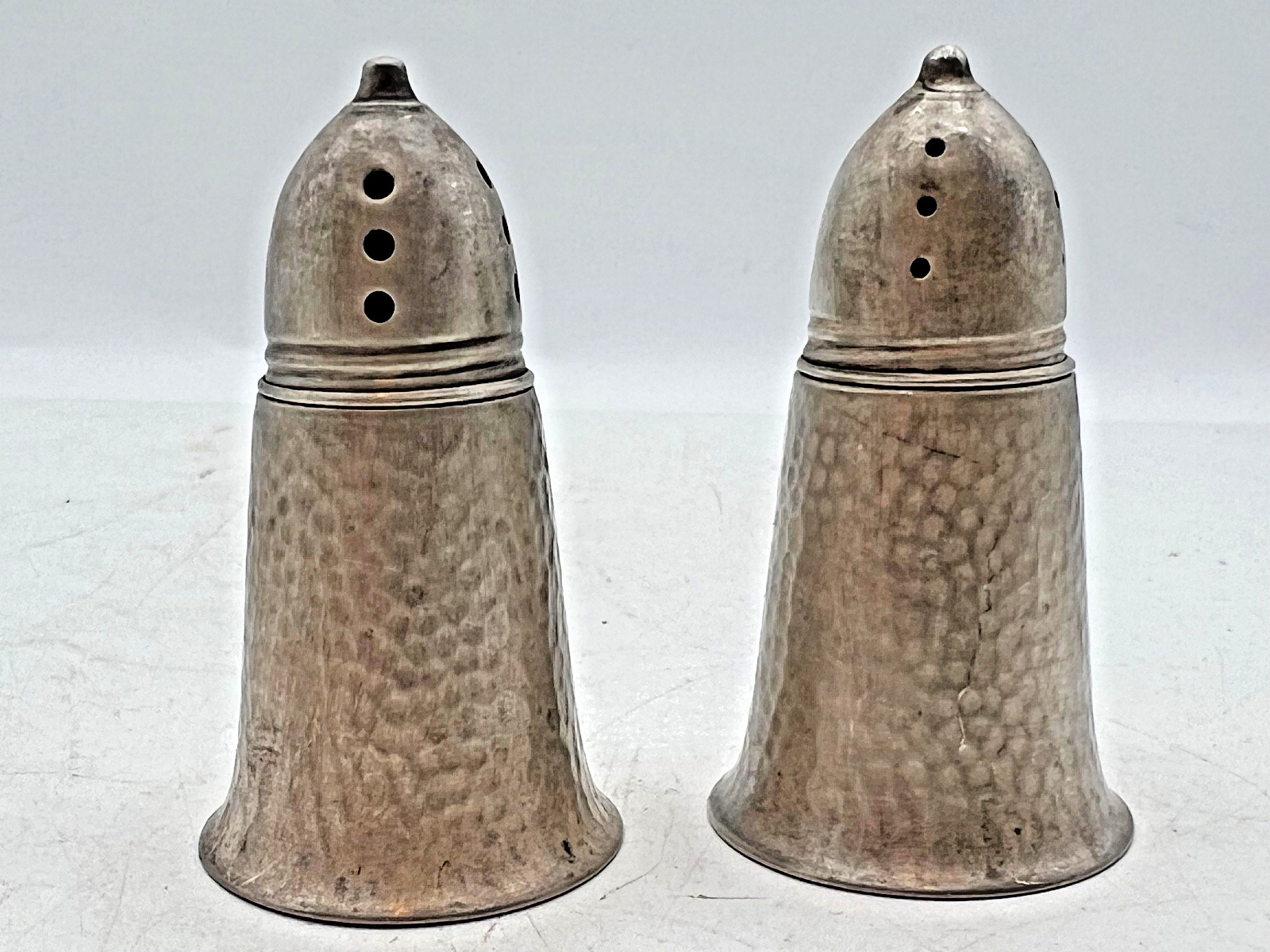 Pair Vintage hand-hammered sterling silver salt and pepper shakers