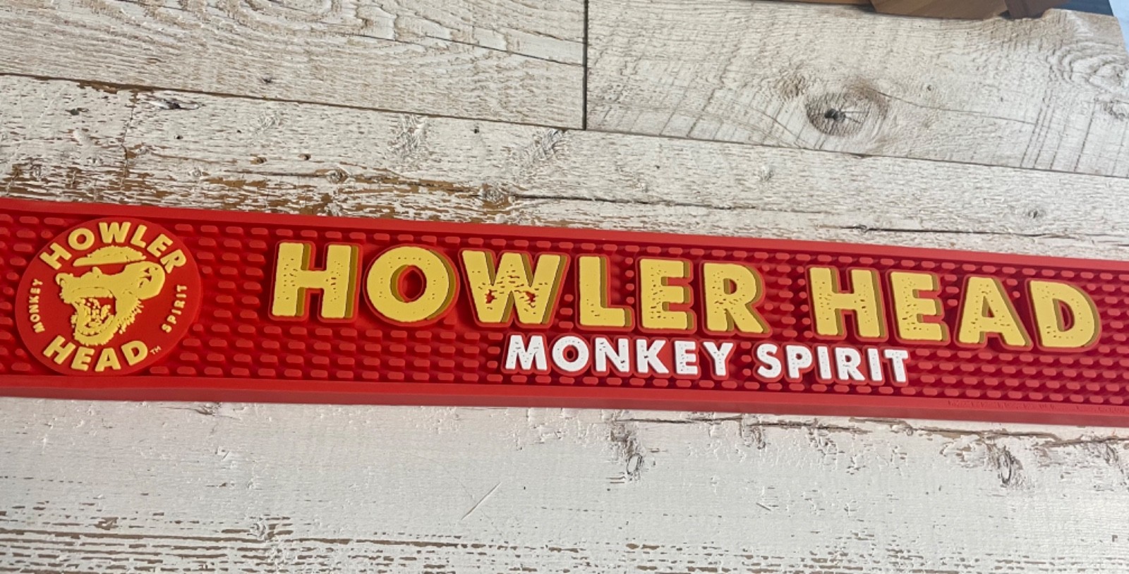 New Old Stock Howler Head Monkey Spirit Red Rubber Bar Tap Mat