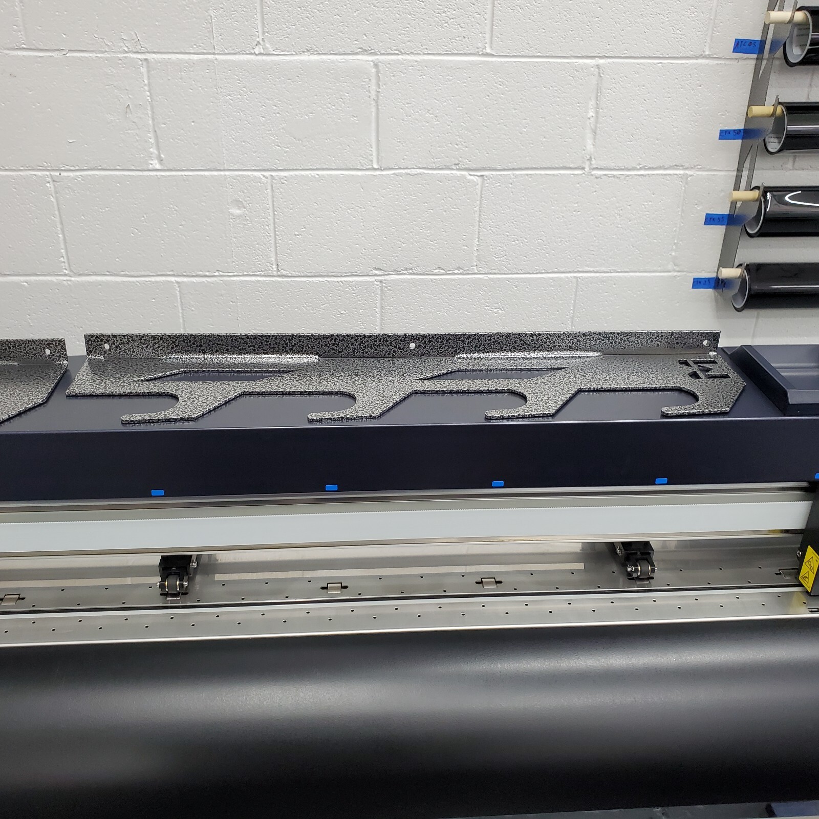 Wall Mounted Tint and Vinyl Wrap rack: The Perfect Solution for Organizing Your