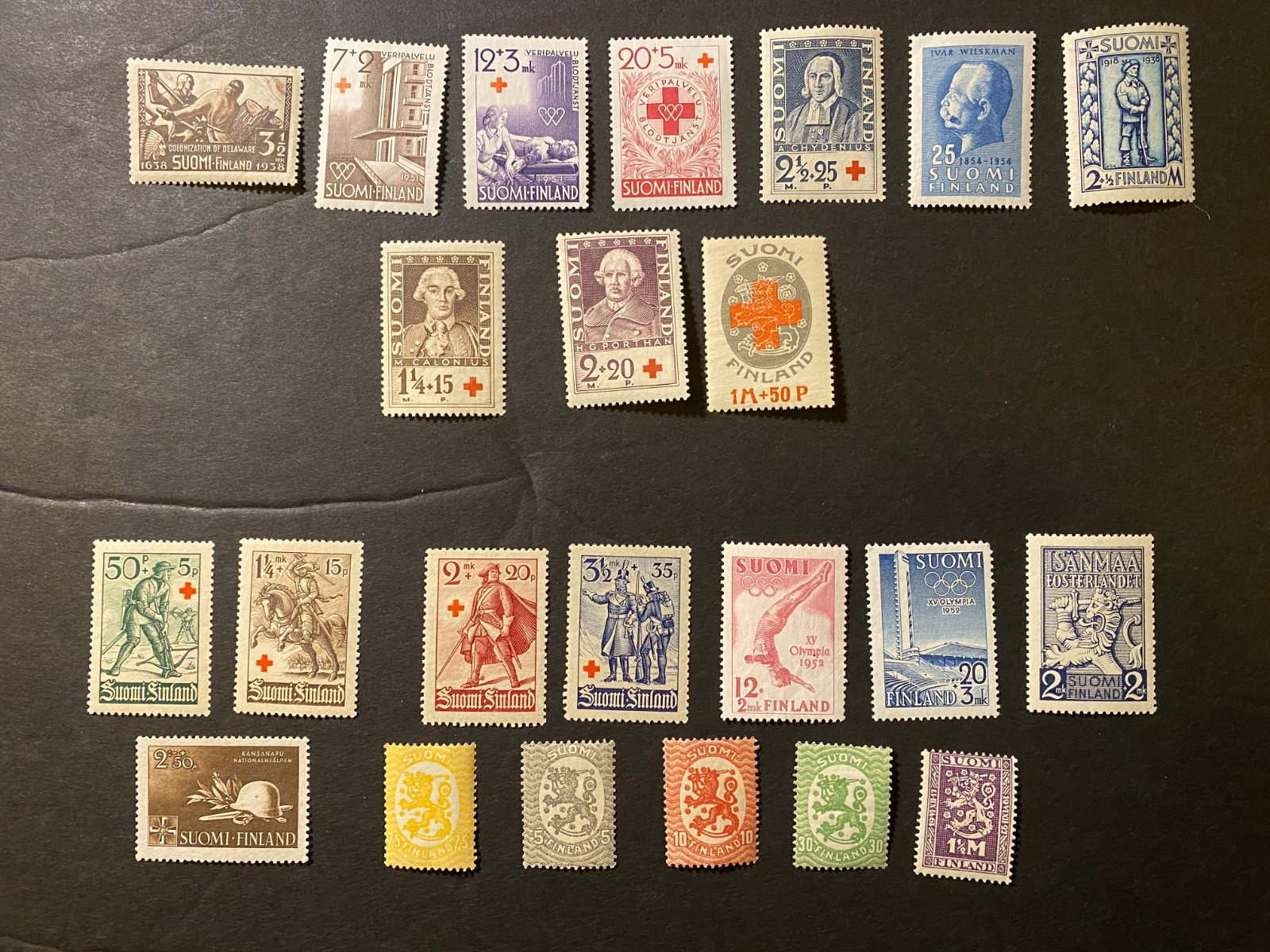 Finland stamps - lot of 23 mint includes B39-43 B104-106 B18-20 214 311 B110 etc