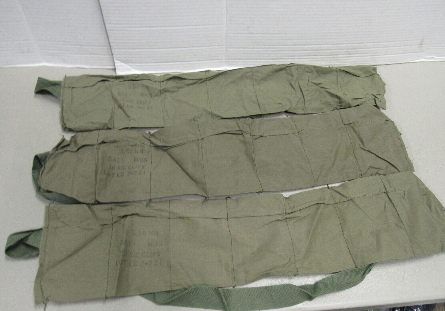 US VIETNAM ERA 7 POCKET AMMO BANDOLIER 1974 DATED UNISSUED US ARMY USMC 223