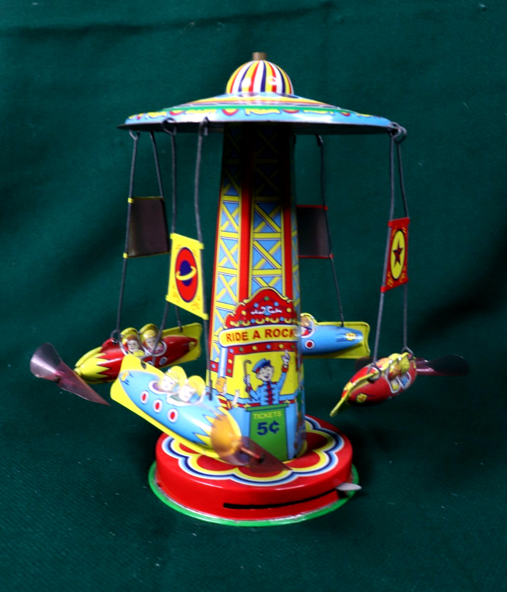 Schylling Reproduction Tin Type Rotating Ride A Rocket Toy 2000 Classic - works