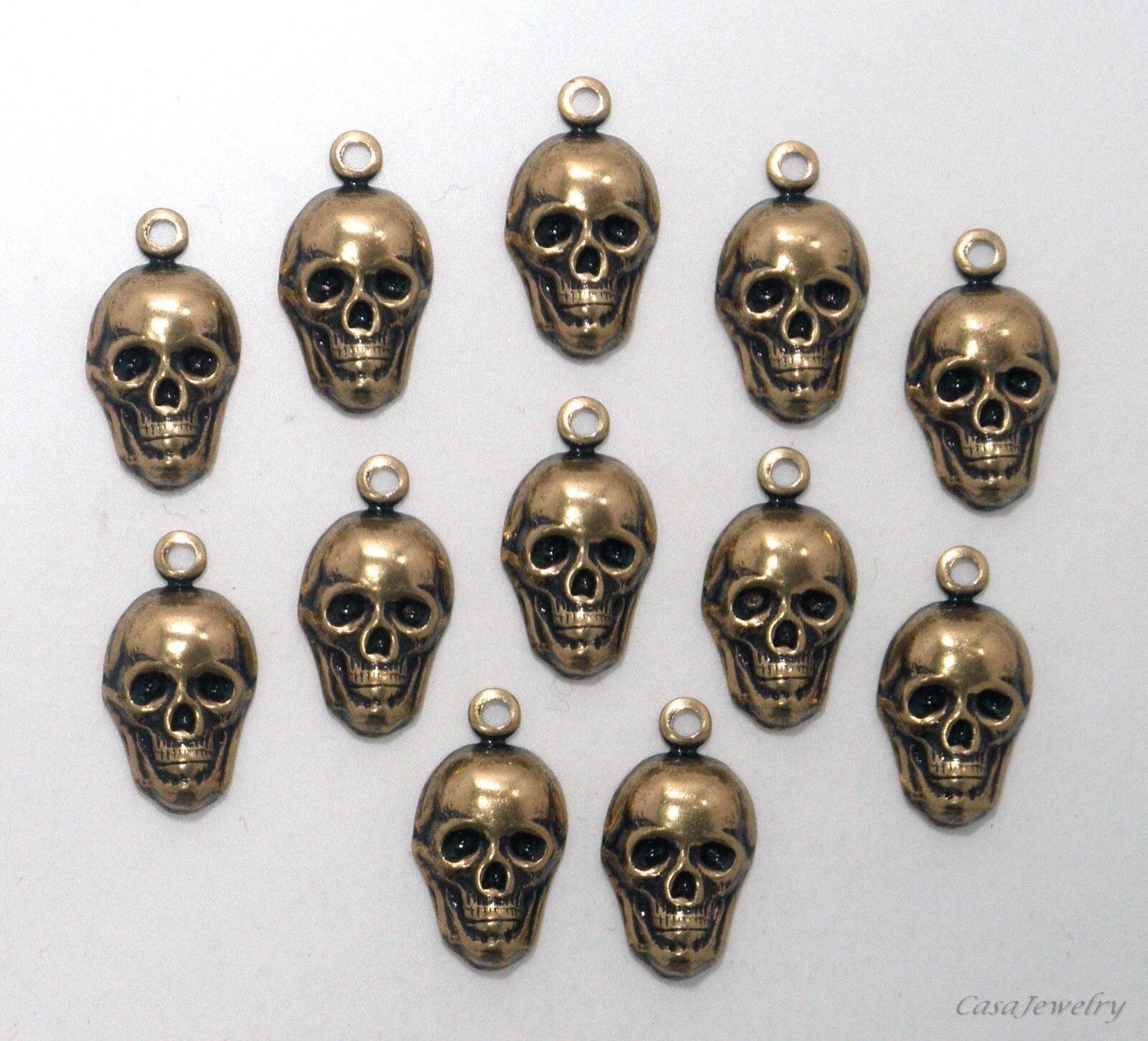 #0288 SMALL ANTIQUED GOLD SKULL W/TOP HANG RING - 12 Pc Lot