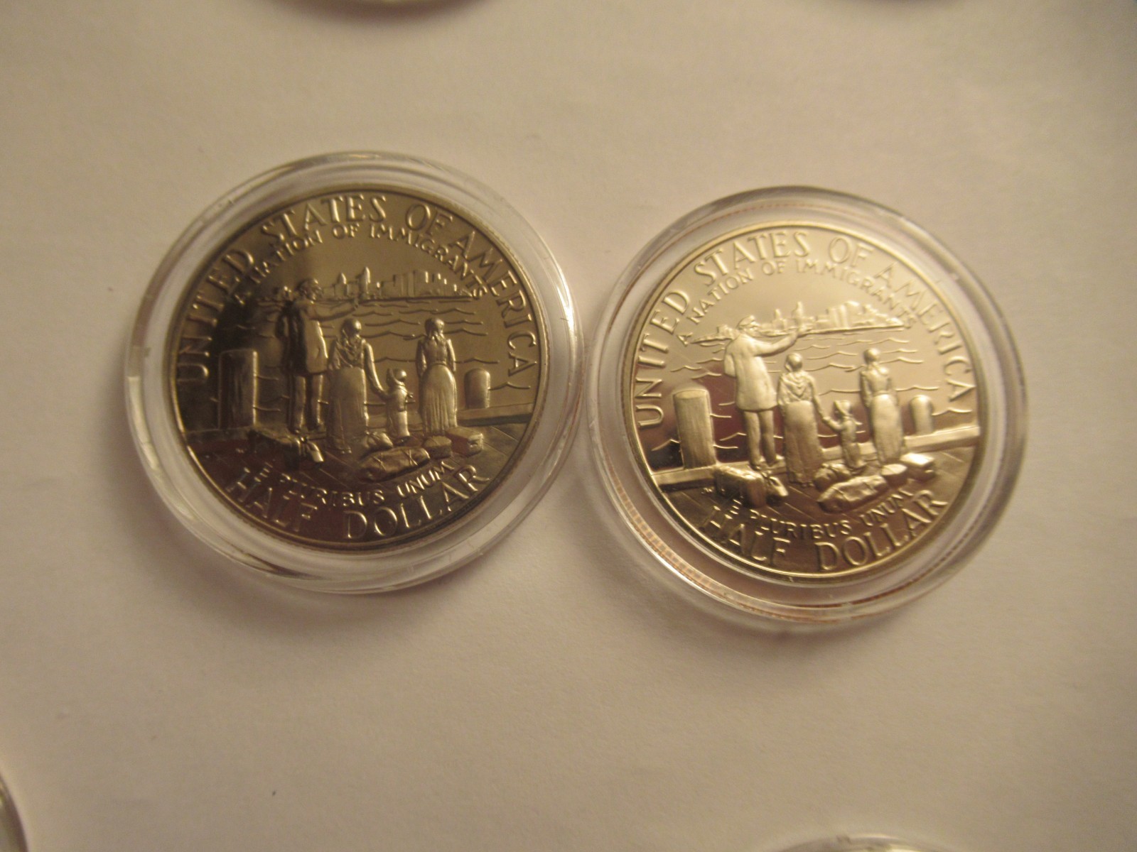 Lot of 11 US Clad half dollars, mix dates, w/ capsules