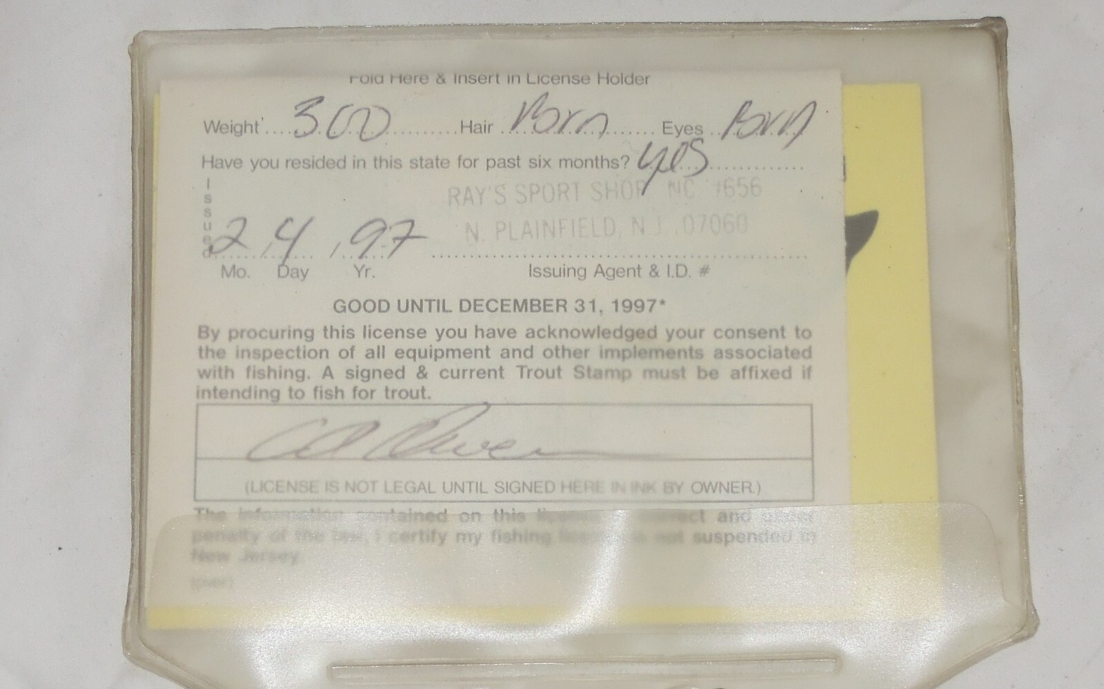 Vintage 1997 NJ resident fishing license with trout stamp
