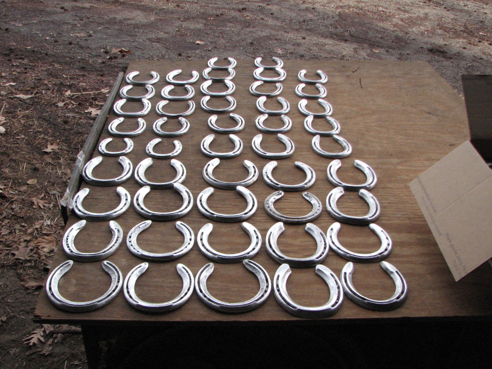 125 used aluminum horseshoes