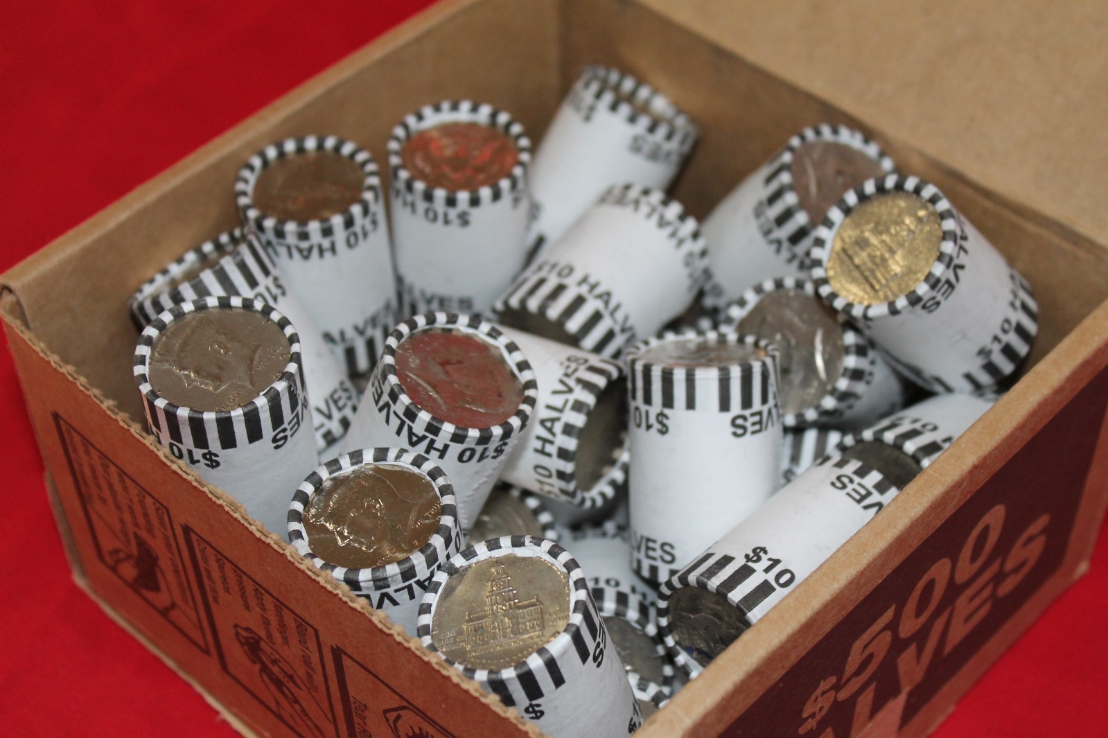 LOOK! CHEAPEST PRICE ON EBAY KENNEDY HALF DOLLAR BANK ROLL SEALED AND UNSEARCHED