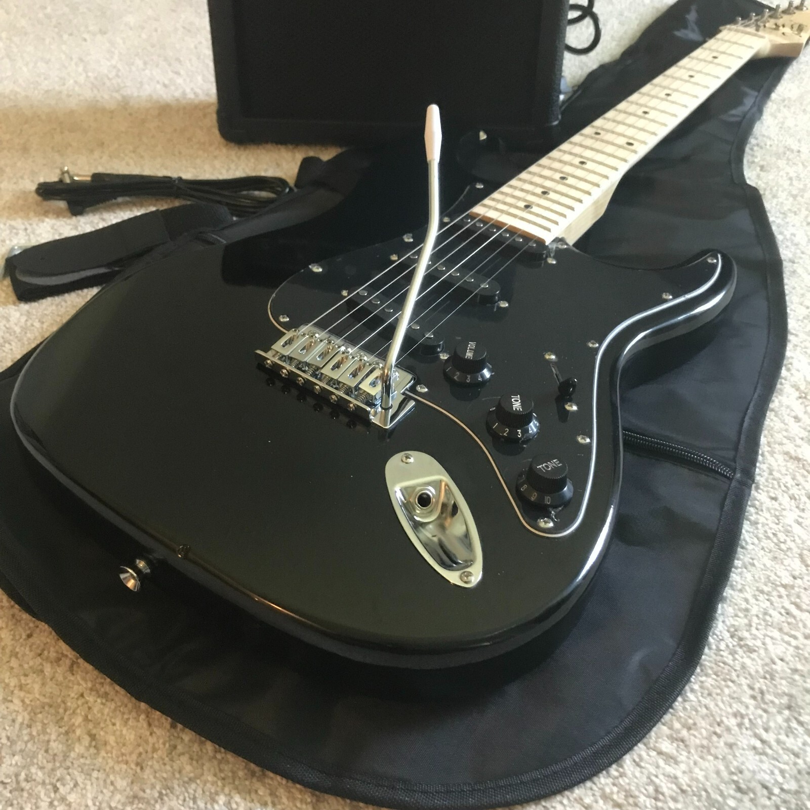 Full-Size Black Electric Guitar Starter Package with 20-Watt Amp and Accessories