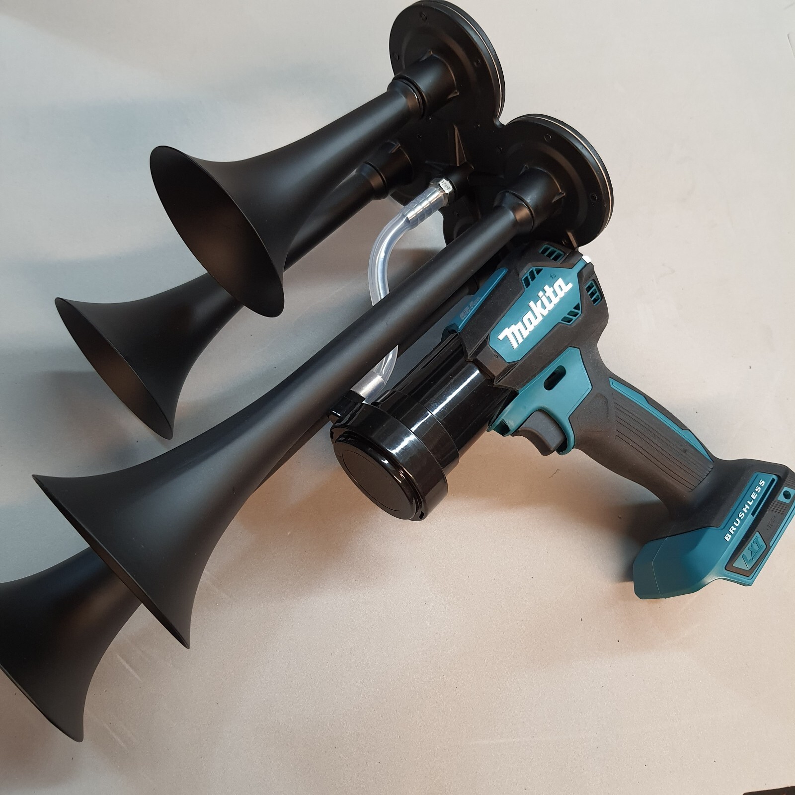 Makita 18 volt Quad Cordless Impact Drill Sports Boat Air Train Horn Compressor