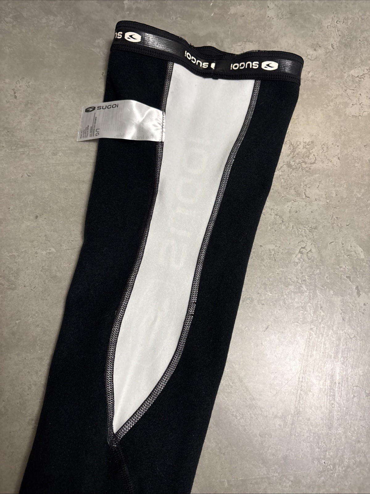New With Tags Sugoi Zap Lined Side Zip Cycling Leg Warmers - Black - Large