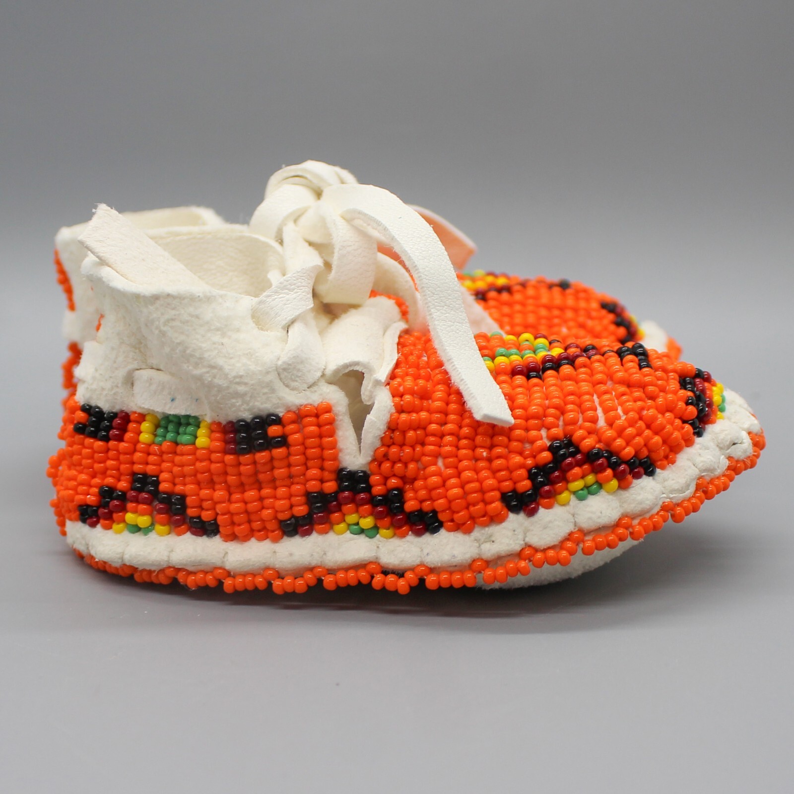 CHEYENNE-FULLY BEADED WHITE LEATHER BABY MOCCASINS by JANET WHITEMAN