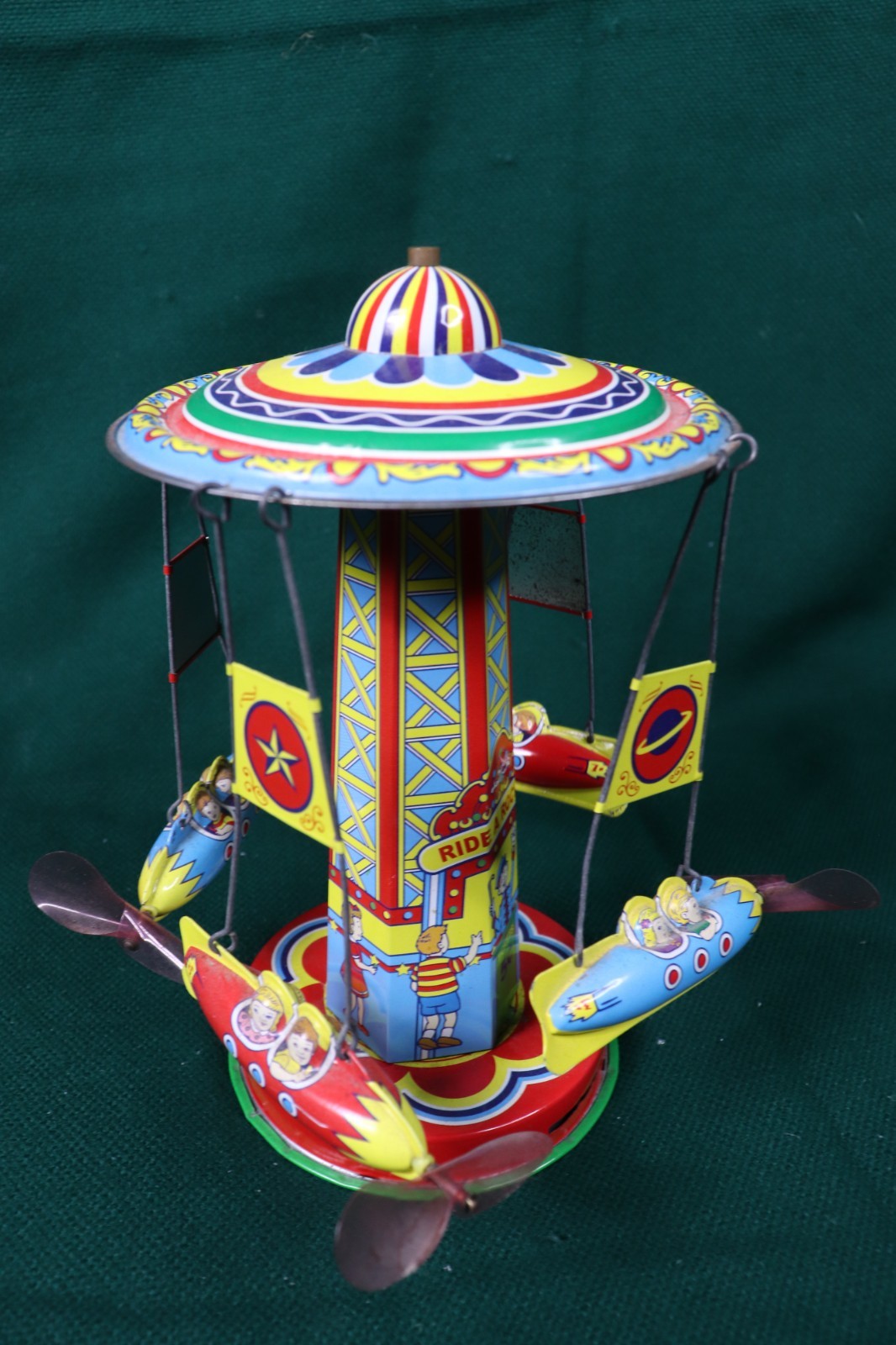 Schylling Reproduction Tin Type Rotating Ride A Rocket Toy 2000 Classic - works