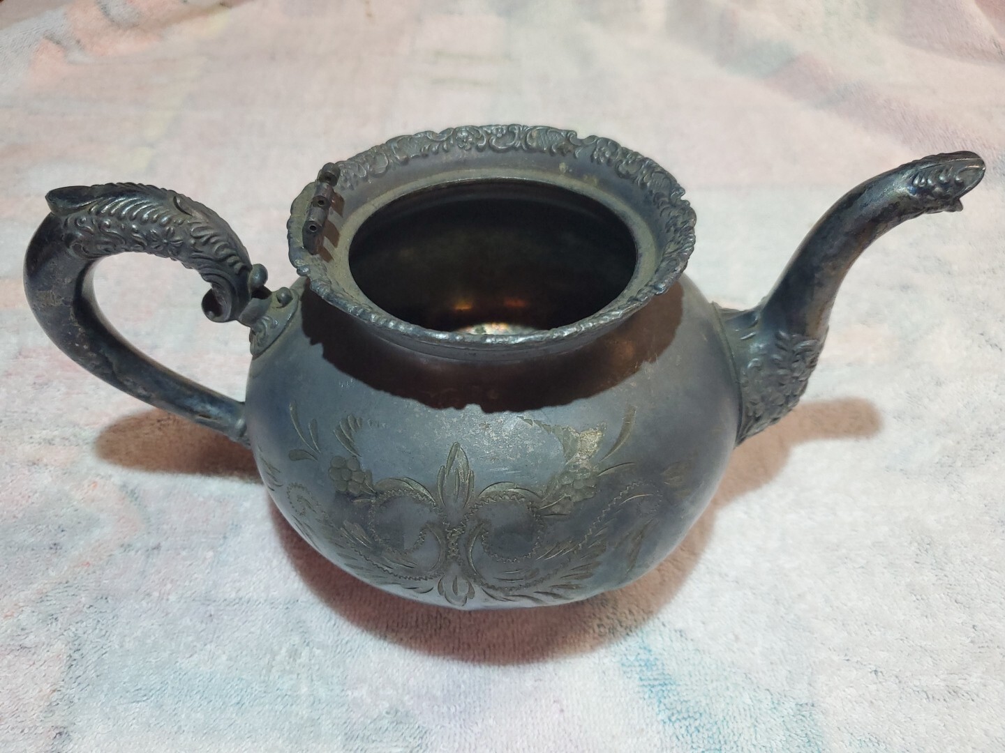 Beautifully hand-carved antique silver-plated teapot