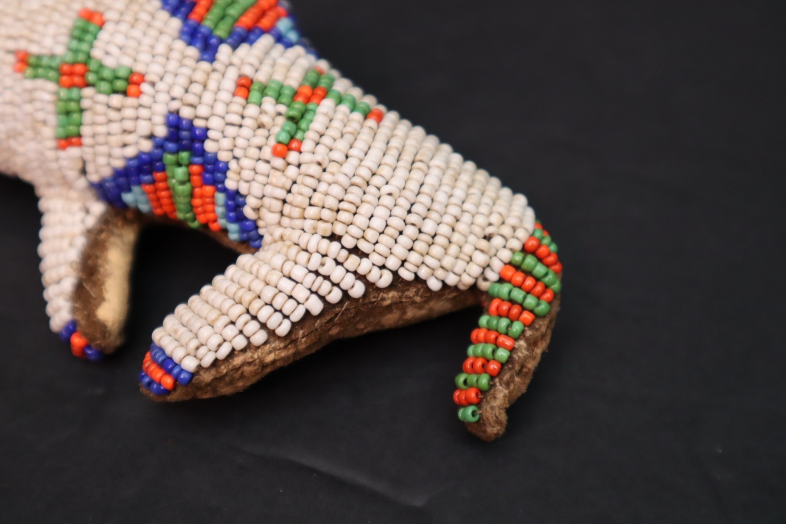 HAND MADE NATIVE AMERICAN BEADED LEATHER FETISH, BUFFALO AMULET