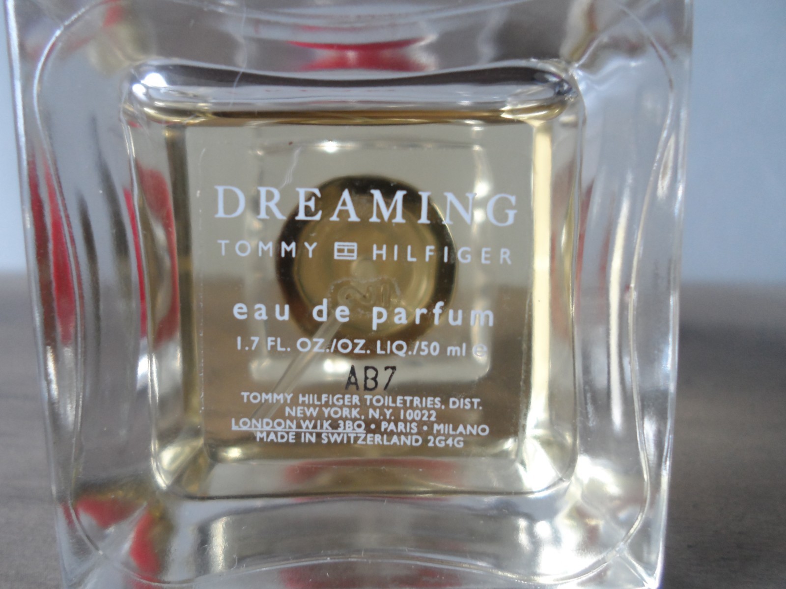 Dreaming Tommy Hilfiger EDP Spray 1.7 oz Unboxed Print On The Bottle Is Smeared