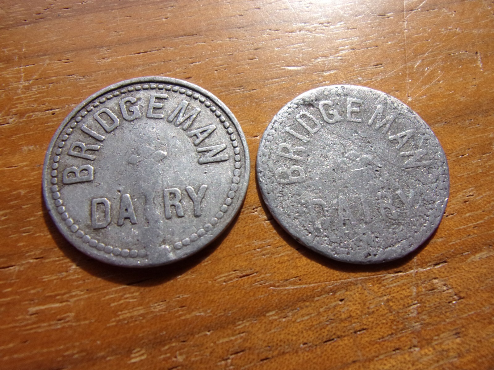 CADILLAC MICHIGAN DAIRY MILK ONE QUART 2 TRADE TOKEN